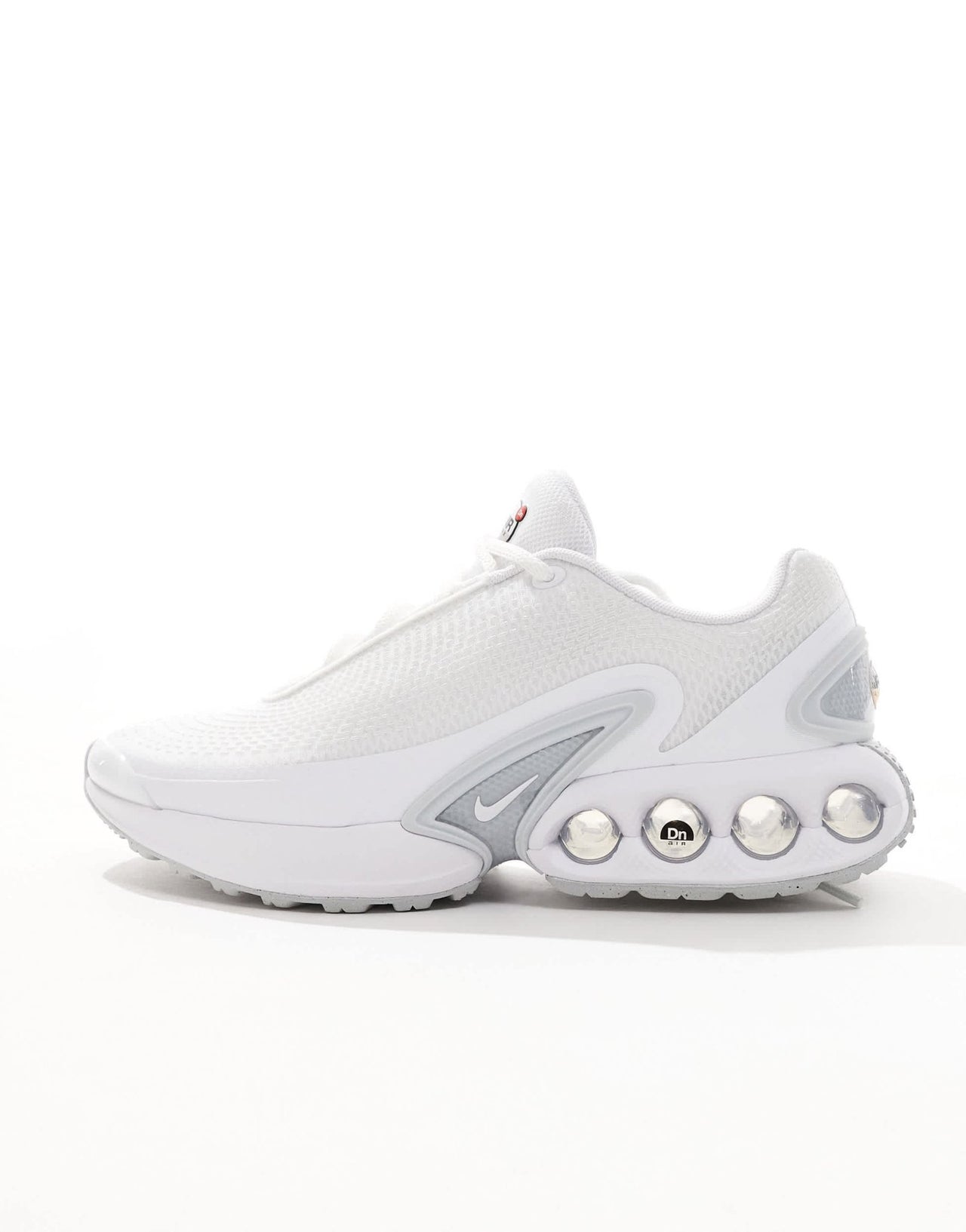 Nike Air Max DN trainers in white and metallic silver - ASOS Sample Sale