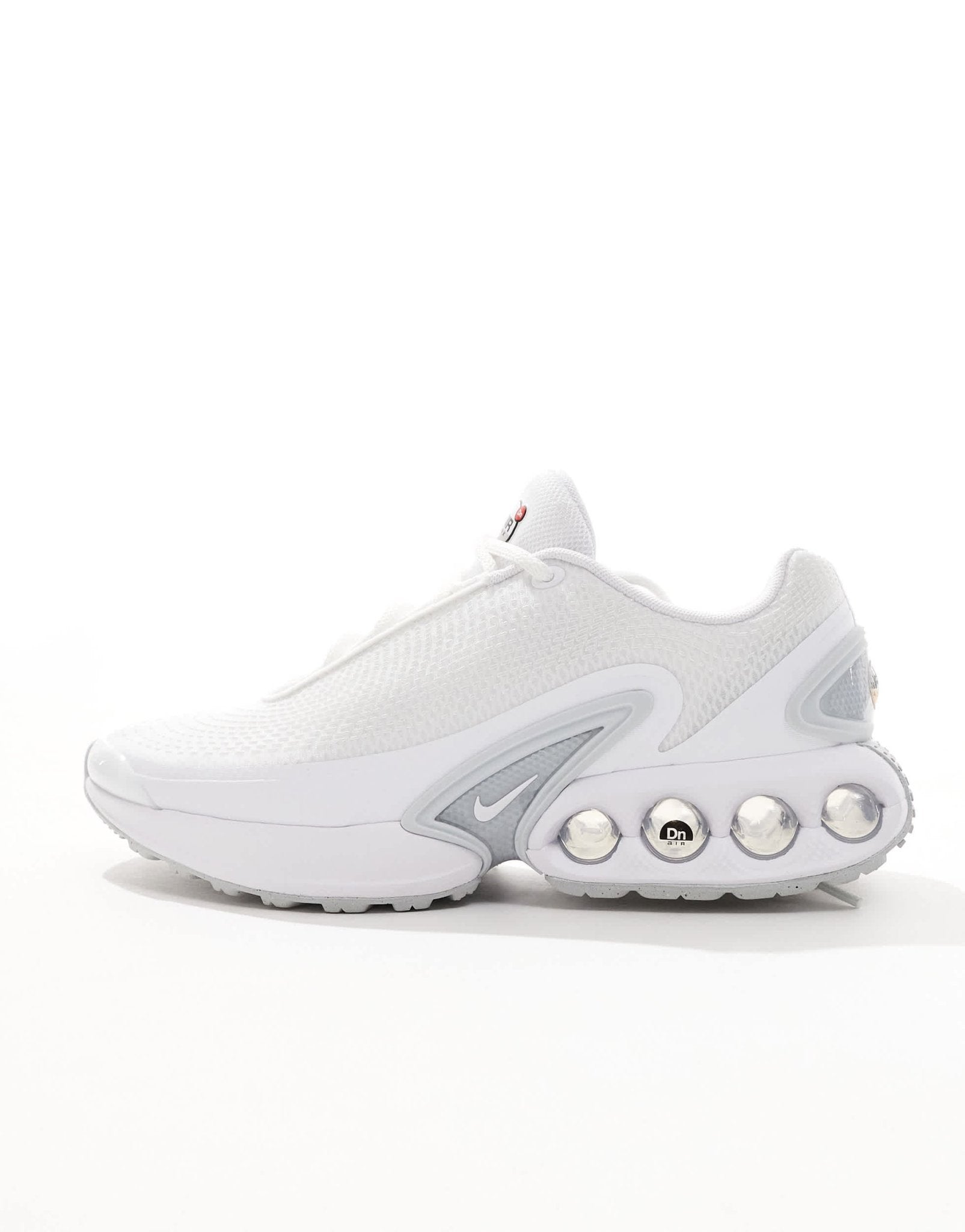 Nike Air Max DN trainers in white and metallic silver - ASOS Sample Sale