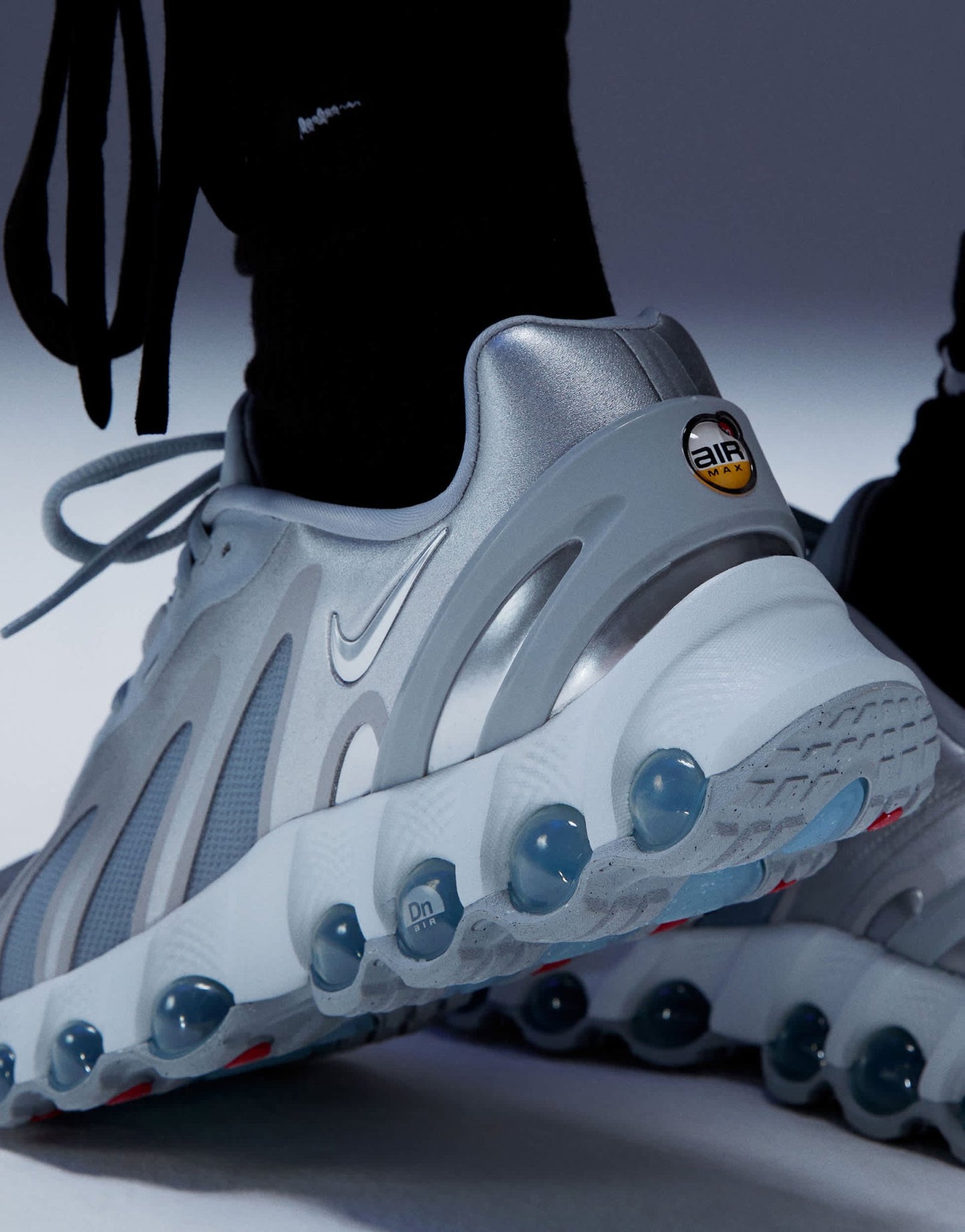 Nike Air Max DN8 trainers in white and silver - ASOS Sample Sale