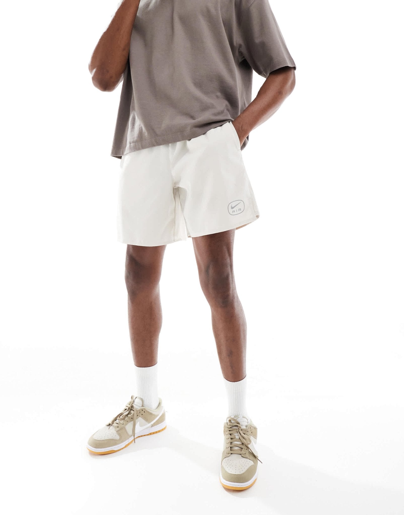 Nike Air Run shorts in beige - ASOS Sample Sale