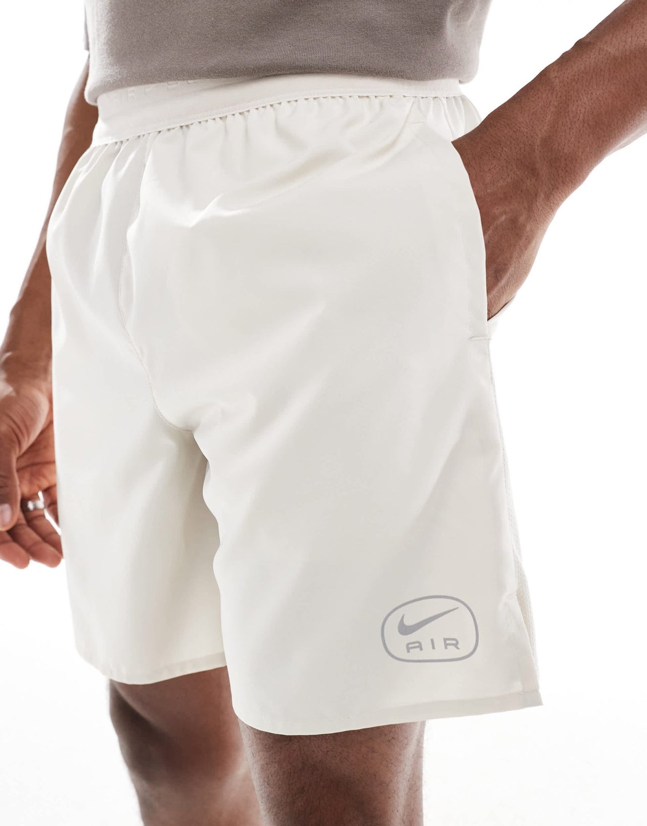 Nike Air Run shorts in beige - ASOS Sample Sale