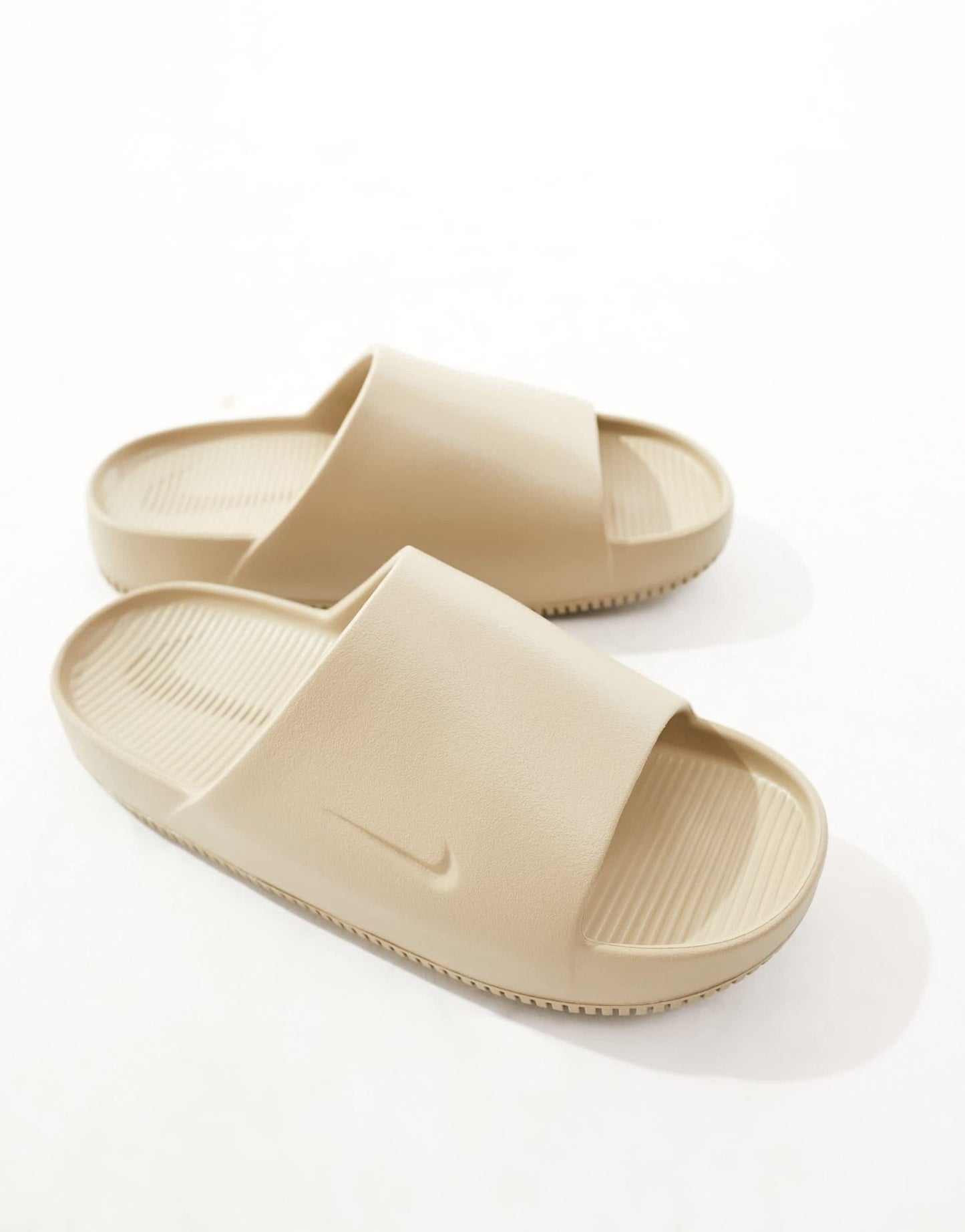 Nike Calm sliders in beige - ASOS Sample Sale