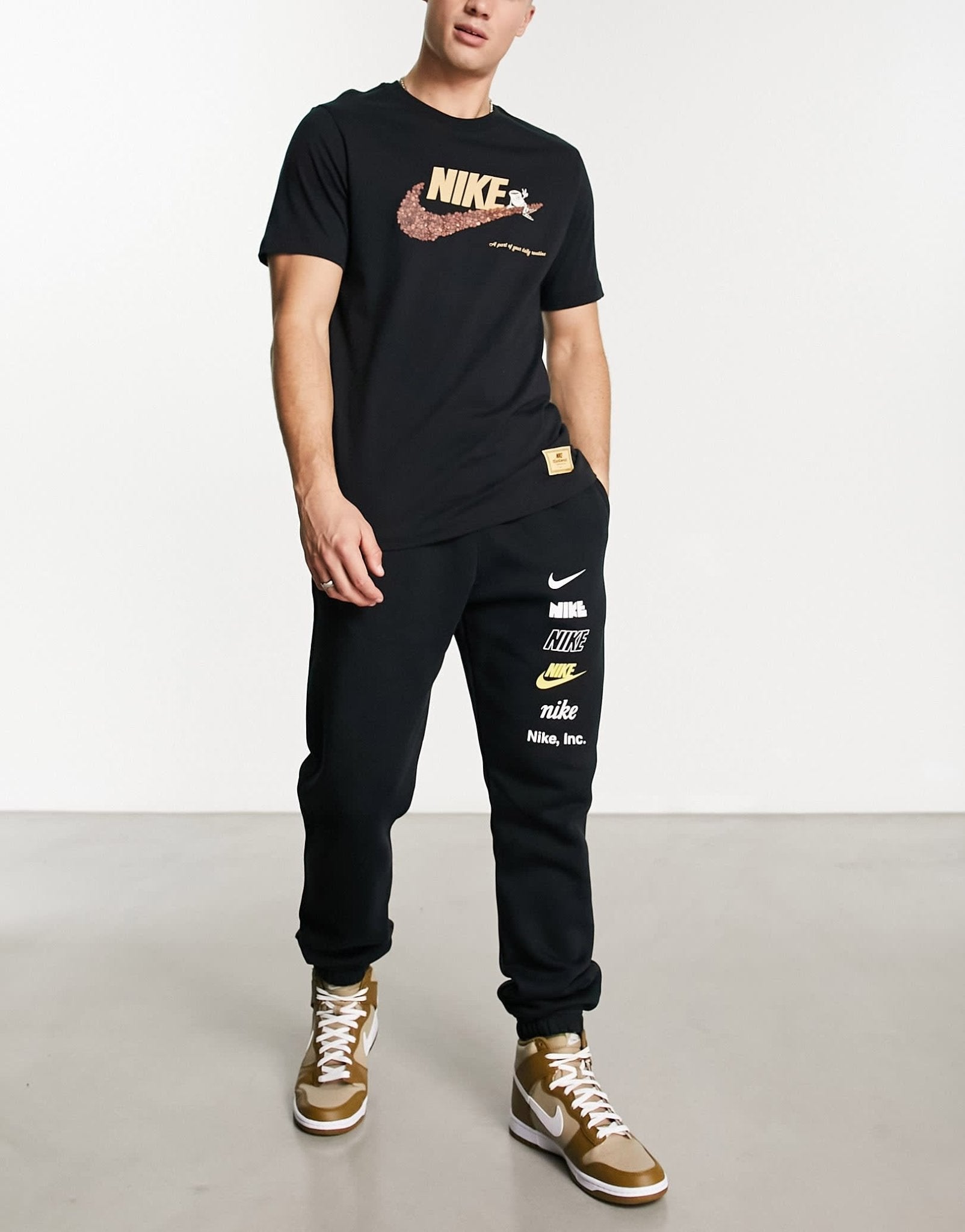 Nike Club logo joggers in black - ASOS Sample Sale