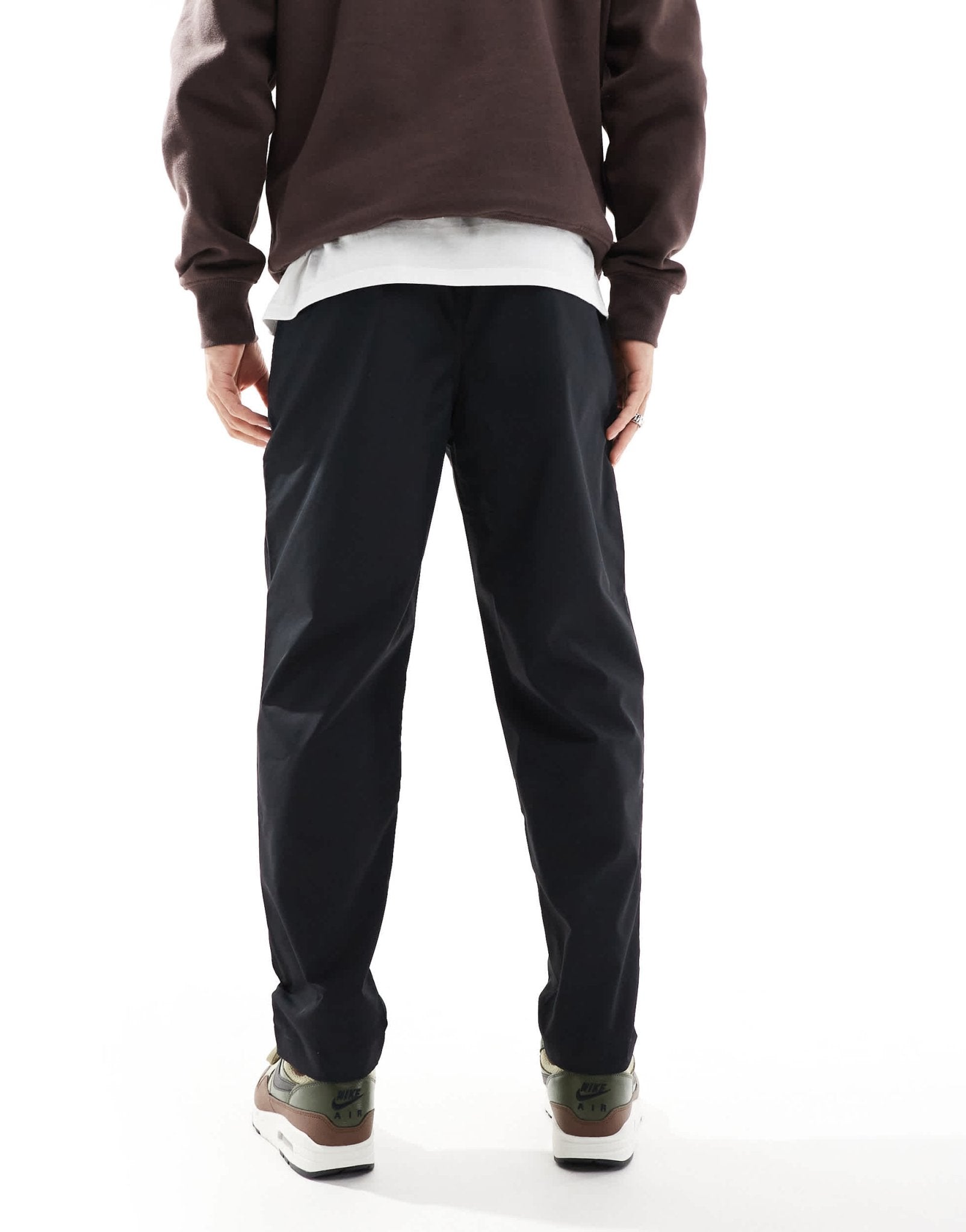 Nike Club woven tapered trousers in black - ASOS Sample Sale