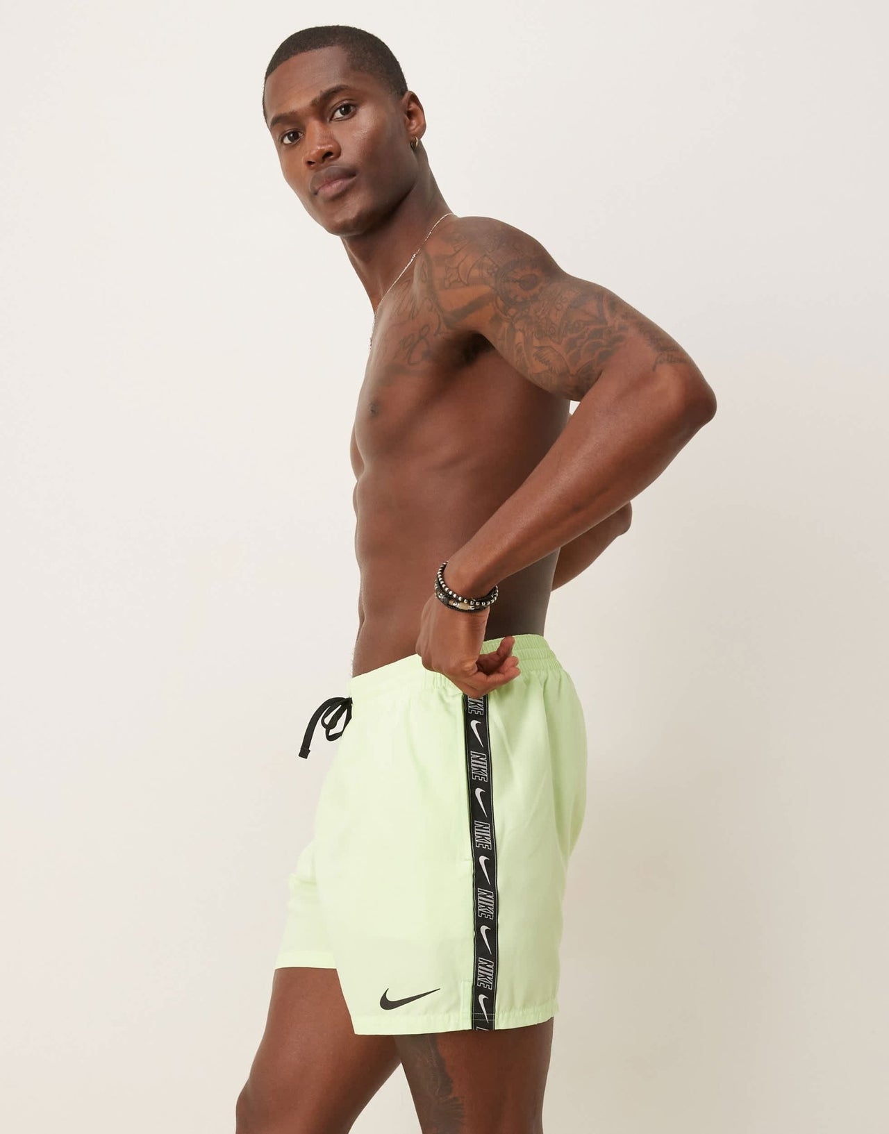 Nike Lap 5 inch Volley logo tape swim shorts in yellow - ASOS Sample Sale