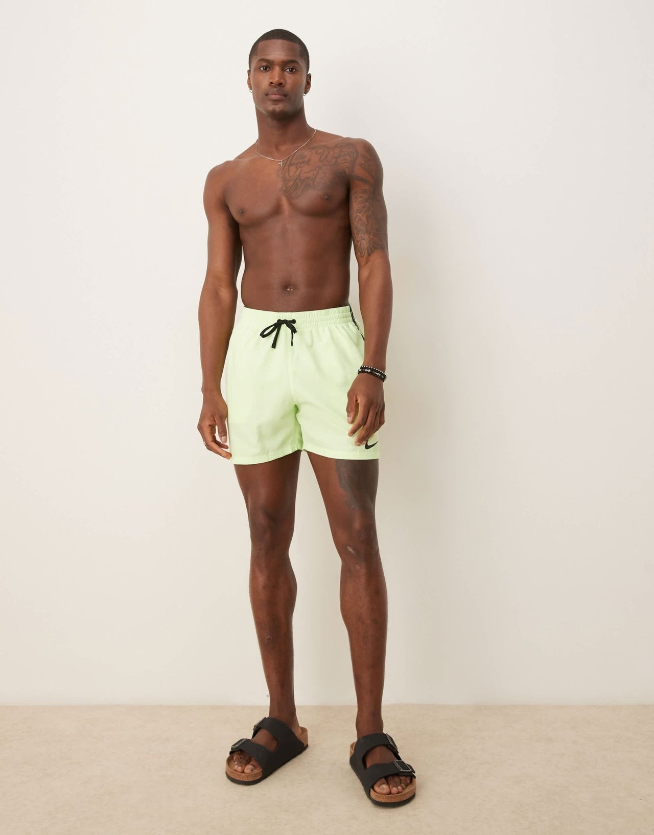 Nike Lap 5 inch Volley logo tape swim shorts in yellow - ASOS Sample Sale