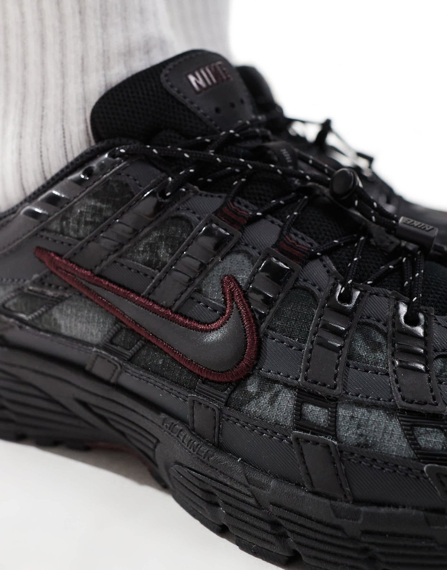 Nike P - 6000 trainers in black and burgundy - ASOS Sample Sale