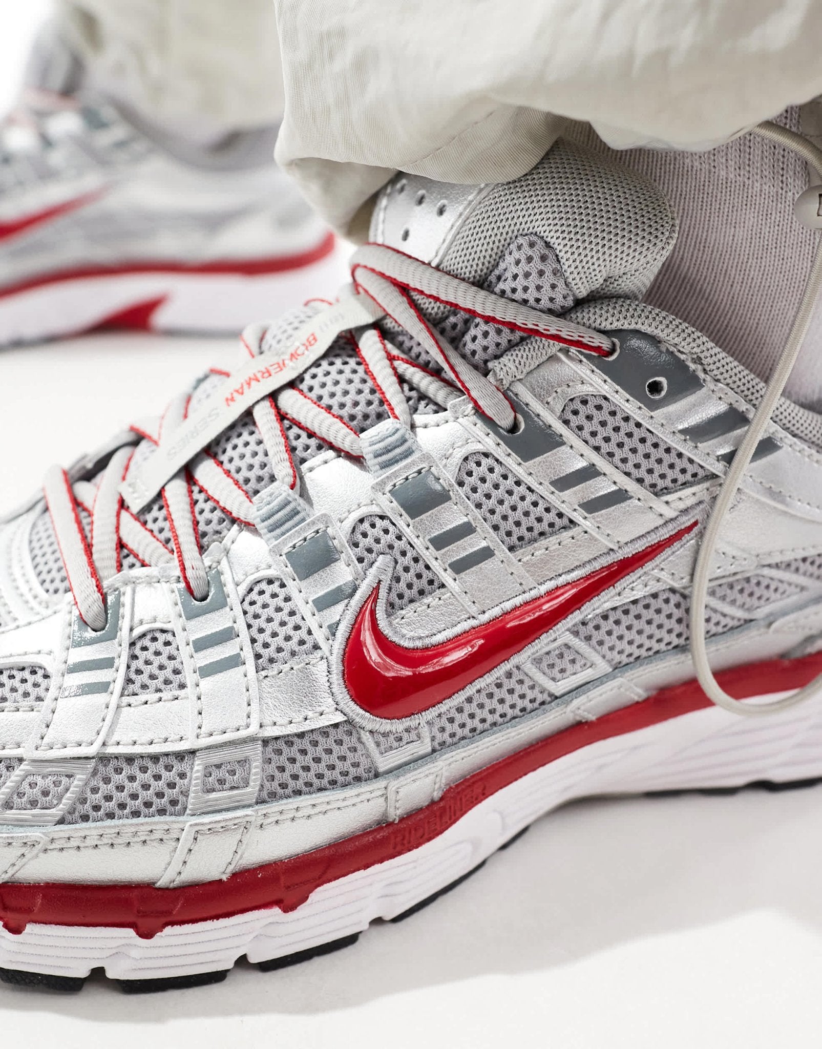 Nike P - 6000 unisex trainers in metallic silver and red - ASOS Sample Sale