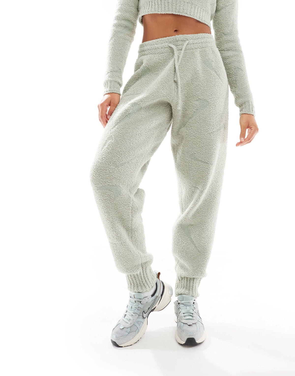 Nike Phoenix Boucle all over print swoosh high-waisted joggers in light green - ASOS Sample Sale