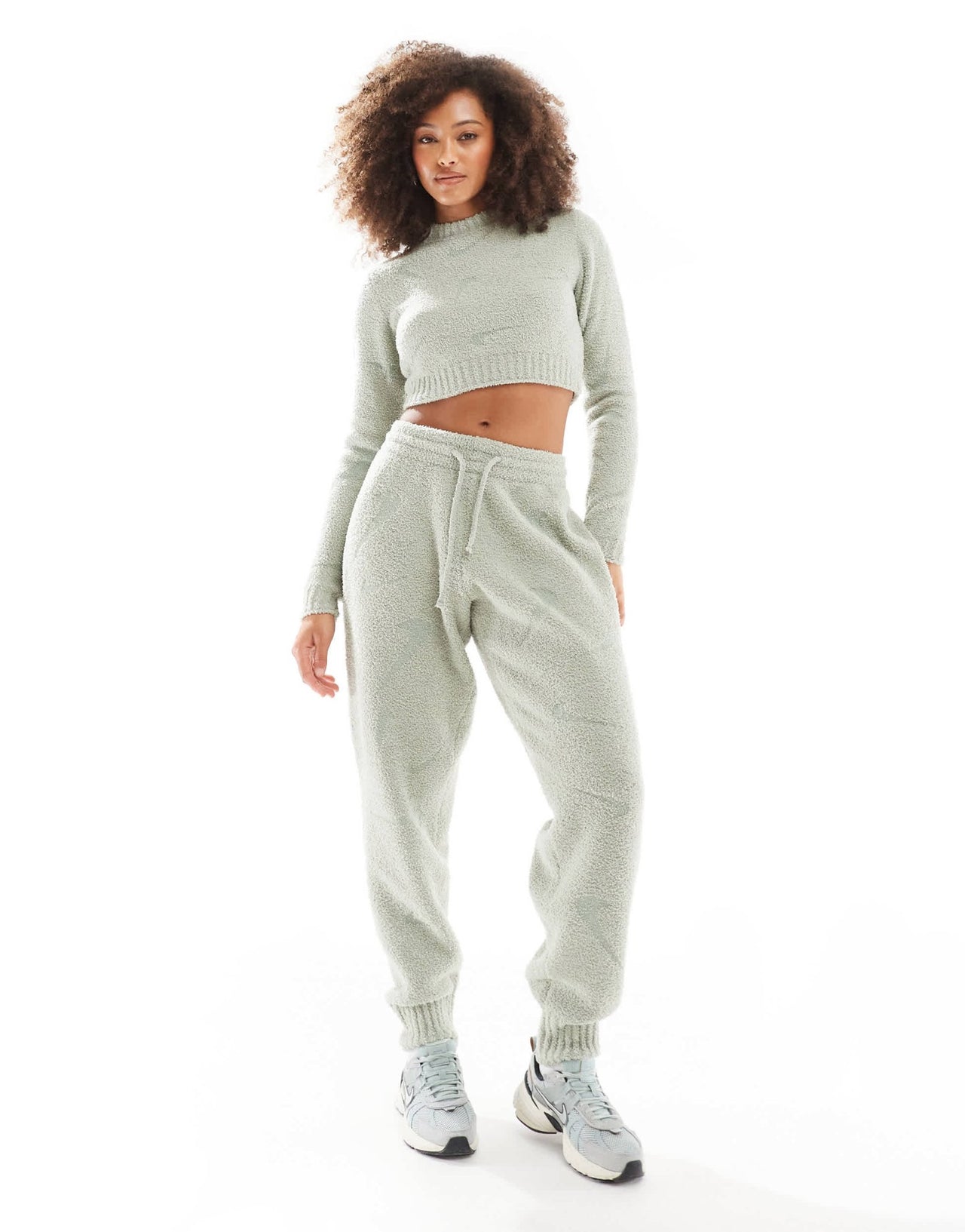 Nike Phoenix Boucle all over print swoosh long sleeve crop top in light green - ASOS Sample Sale