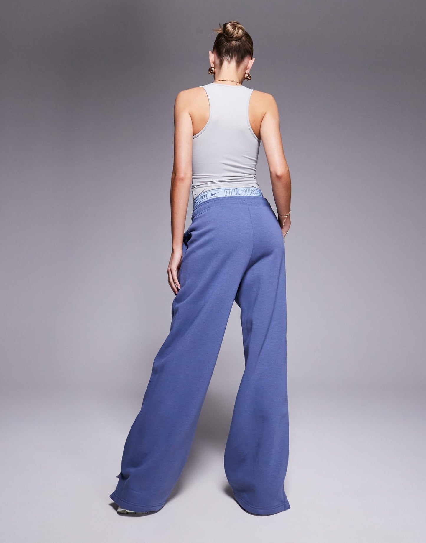 Nike Phoenix Fleece Gym Life Swoosh wide leg joggers with boxer detail in blue - ASOS Sample Sale