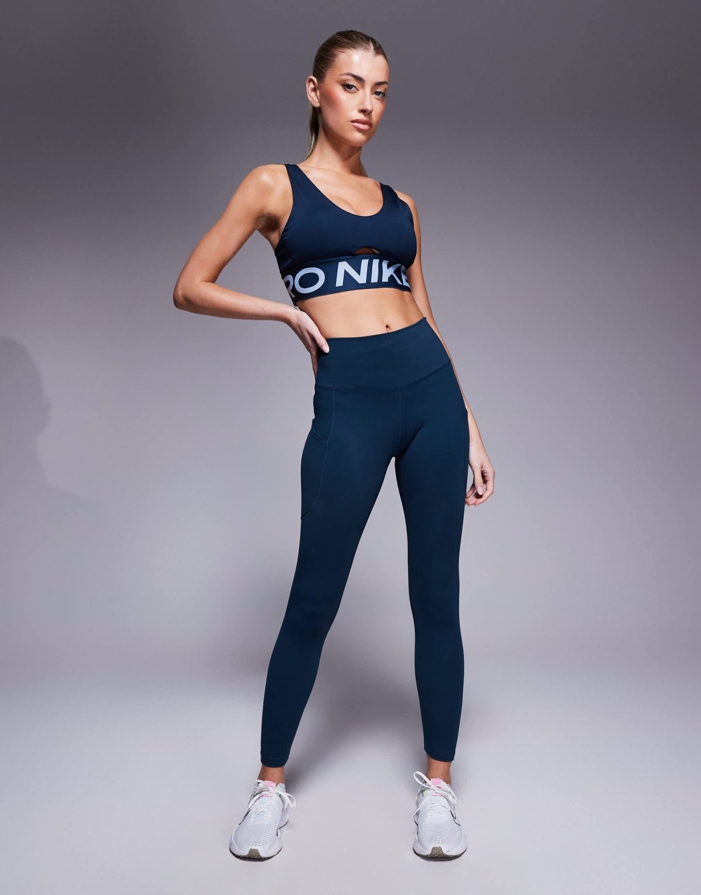 Nike Pro Training Indy Dri - FIT Plunge light support sports bra in navy - ASOS Sample Sale