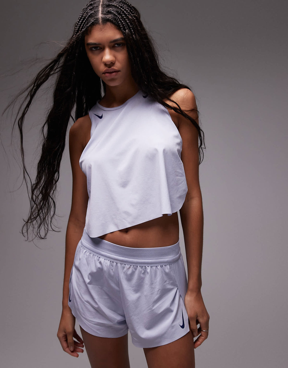 Nike Running Aeroswift Dri-FIT plisse mid rise shorts in purple - ASOS Sample Sale
