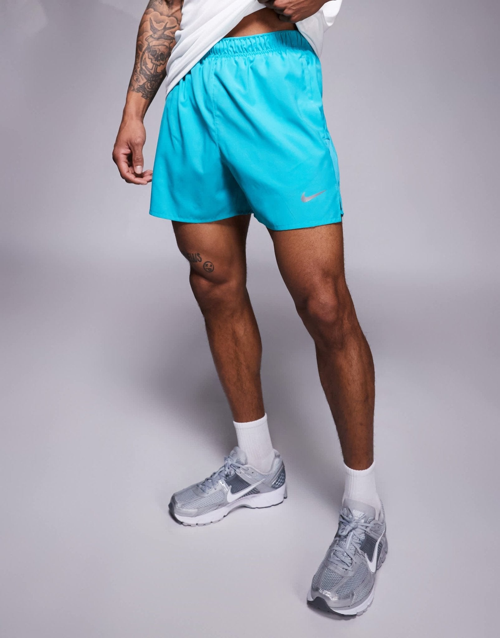 Nike Running Challenger Dri-FIT 5 inch shorts in blue - ASOS Sample Sale