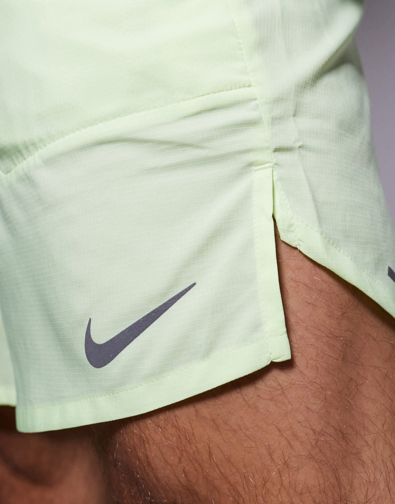 Nike Running Challenger Dri-FIT 7 inch shorts in green - ASOS Sample Sale