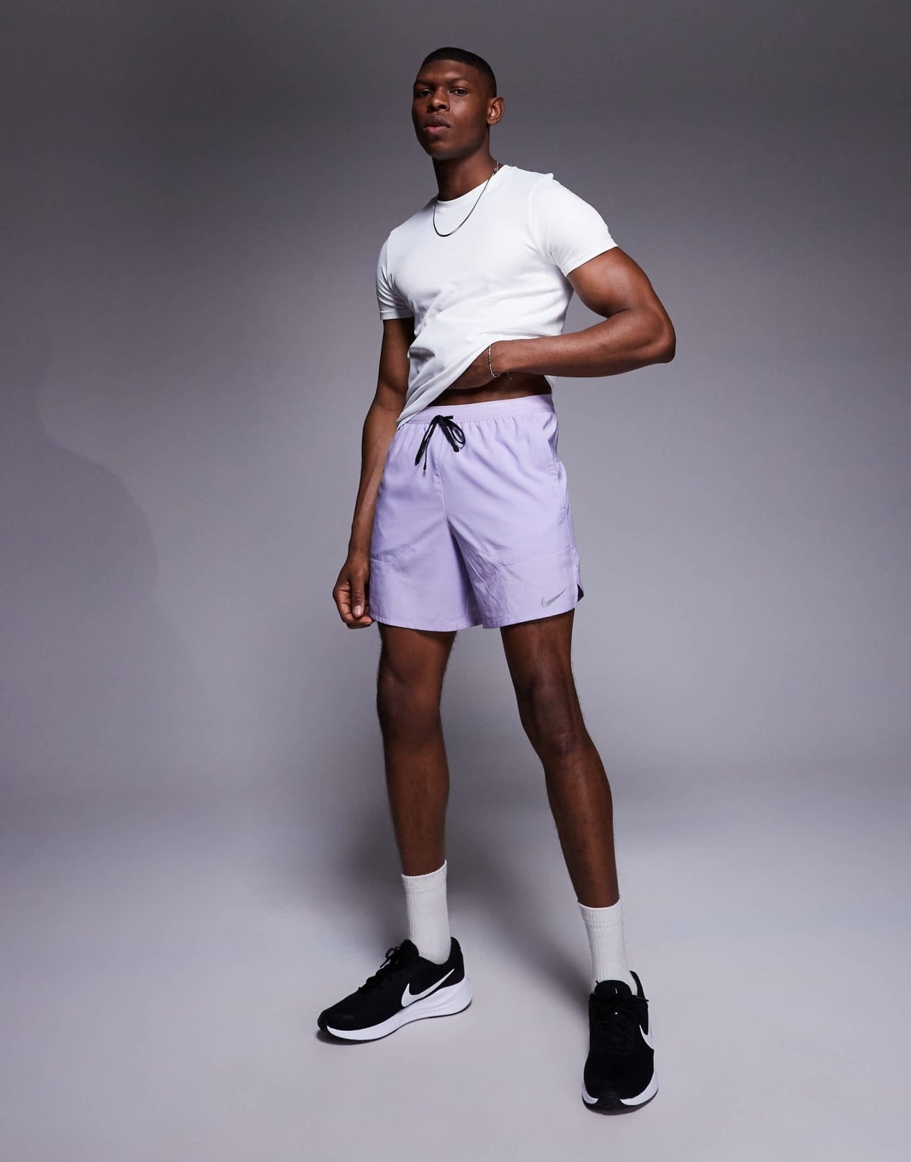 Nike Running Stride Dri-FIT 7 inch shorts in lilac - ASOS Sample Sale
