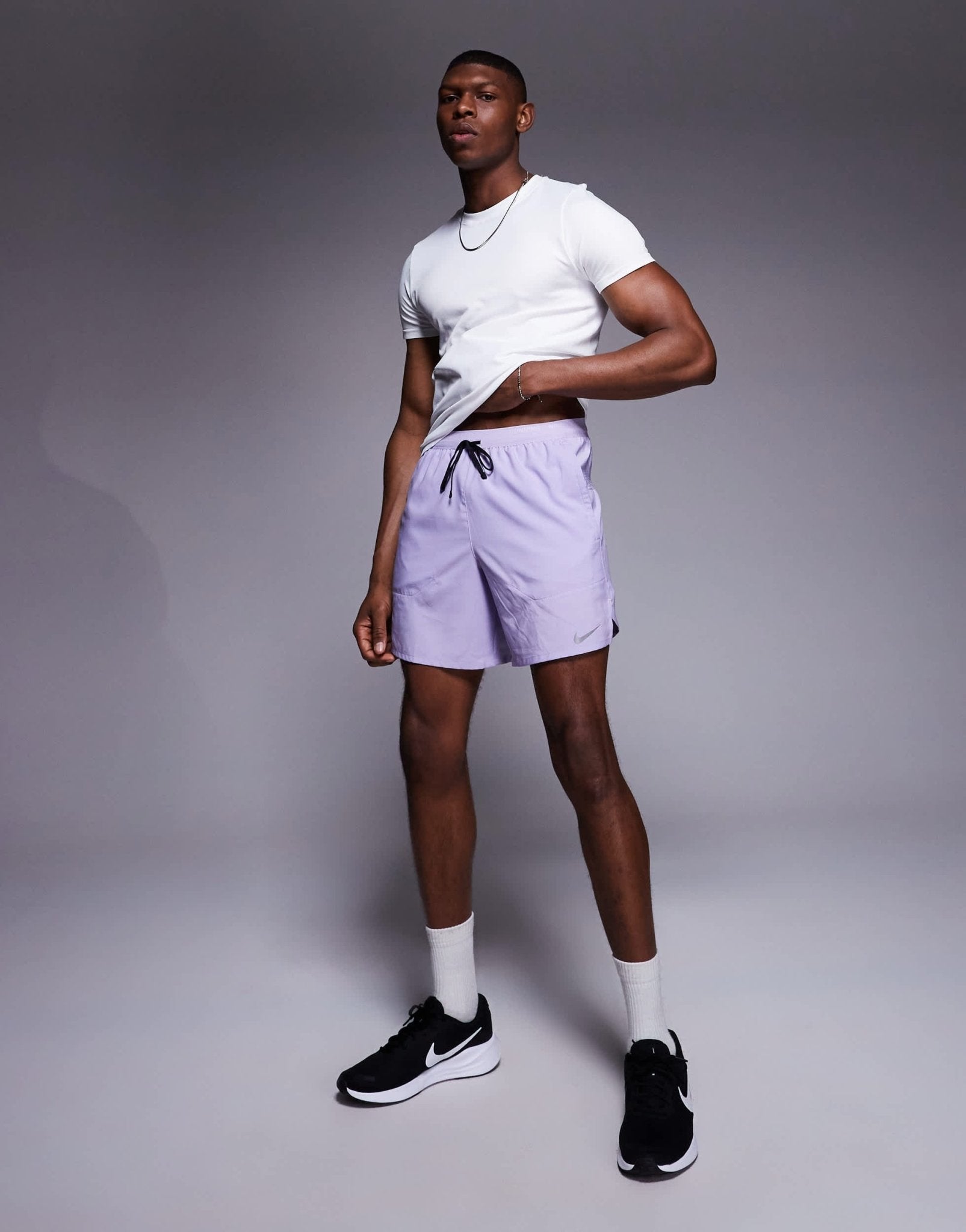 Nike Running Stride Dri-FIT 7 inch shorts in lilac - ASOS Sample Sale