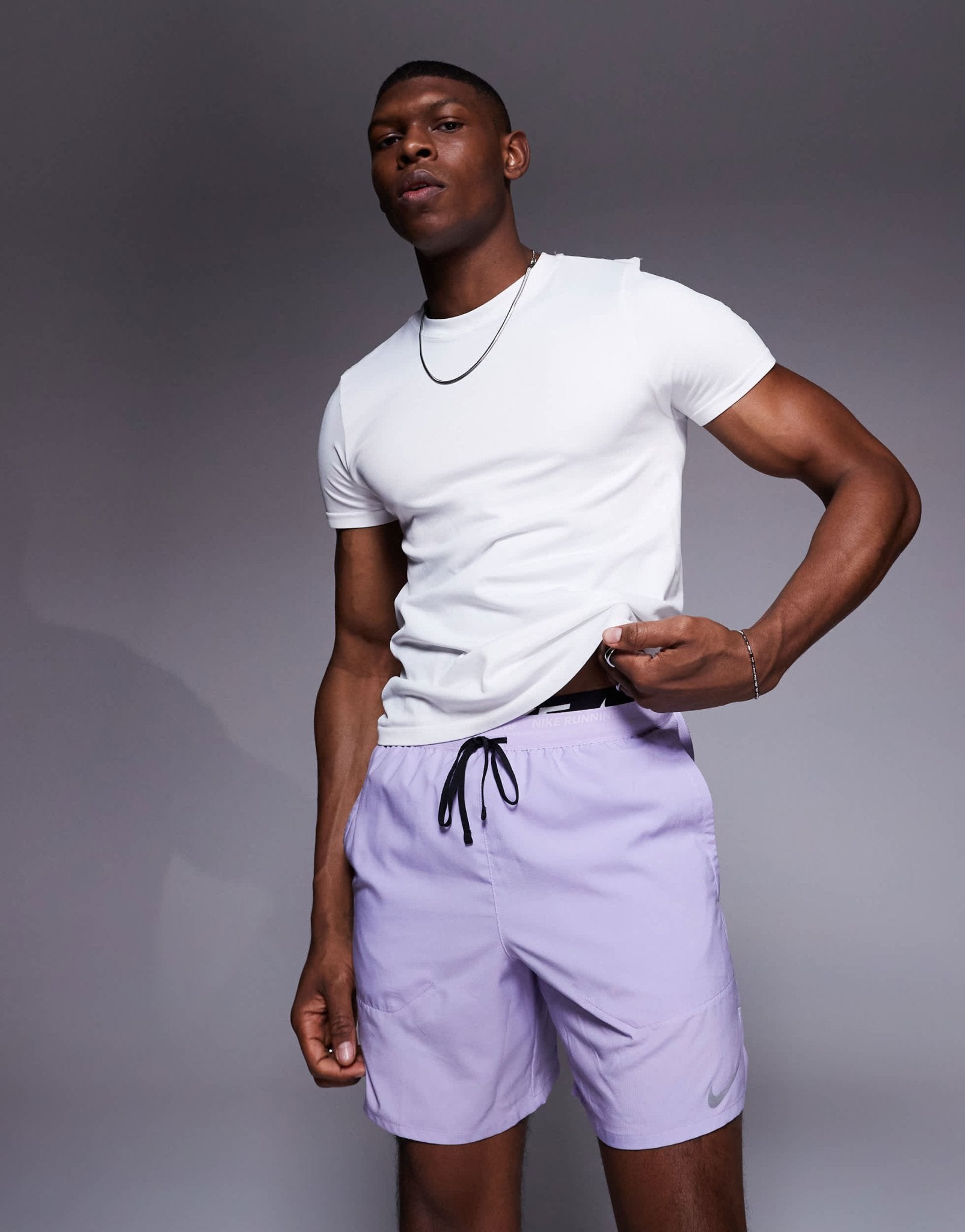 Nike Running Stride Dri-FIT 7 inch shorts in lilac - ASOS Sample Sale