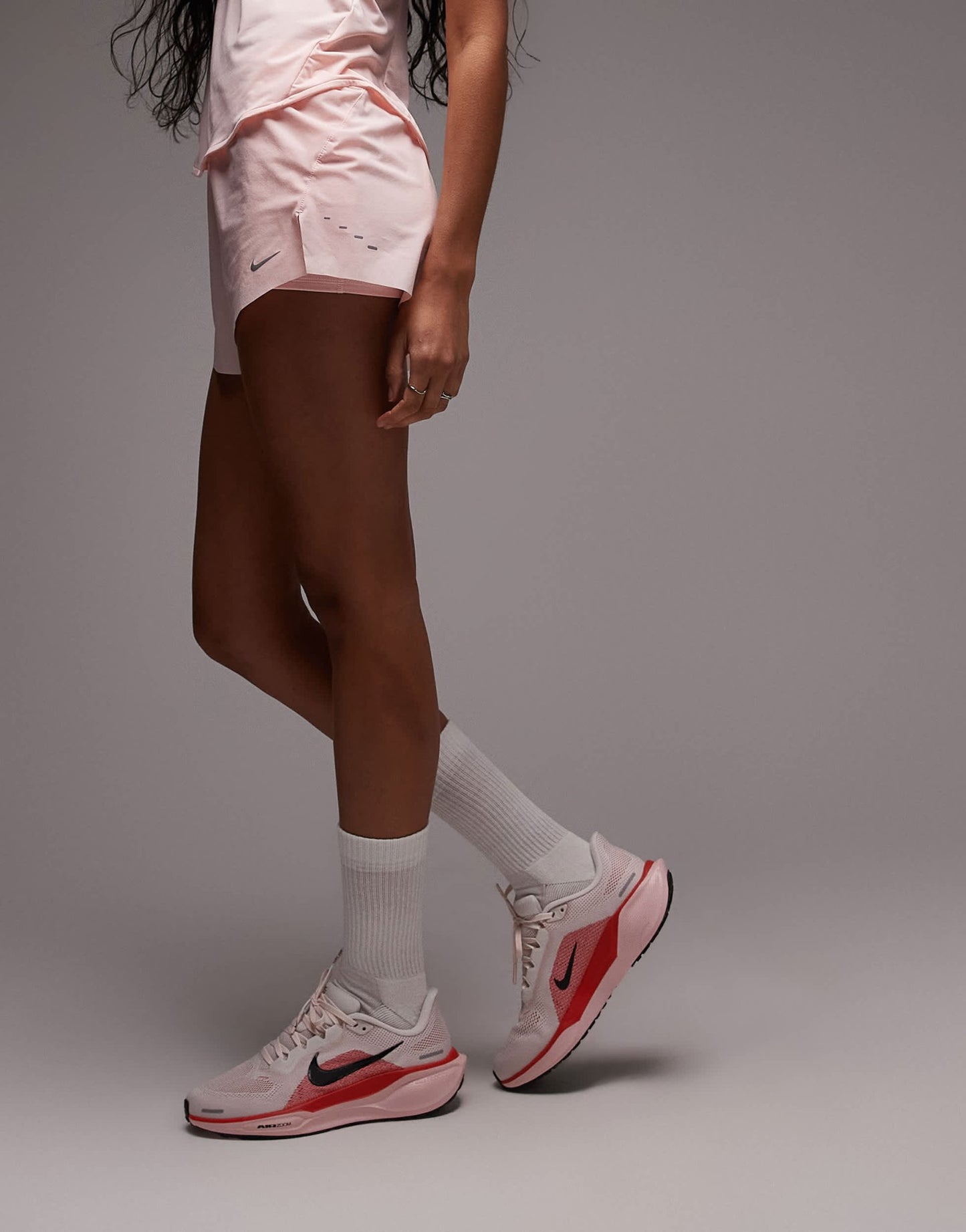 Nike Running Swift Dri-FIT mid rise 3 inch 2 in 1 shorts in pink - ASOS Sample Sale
