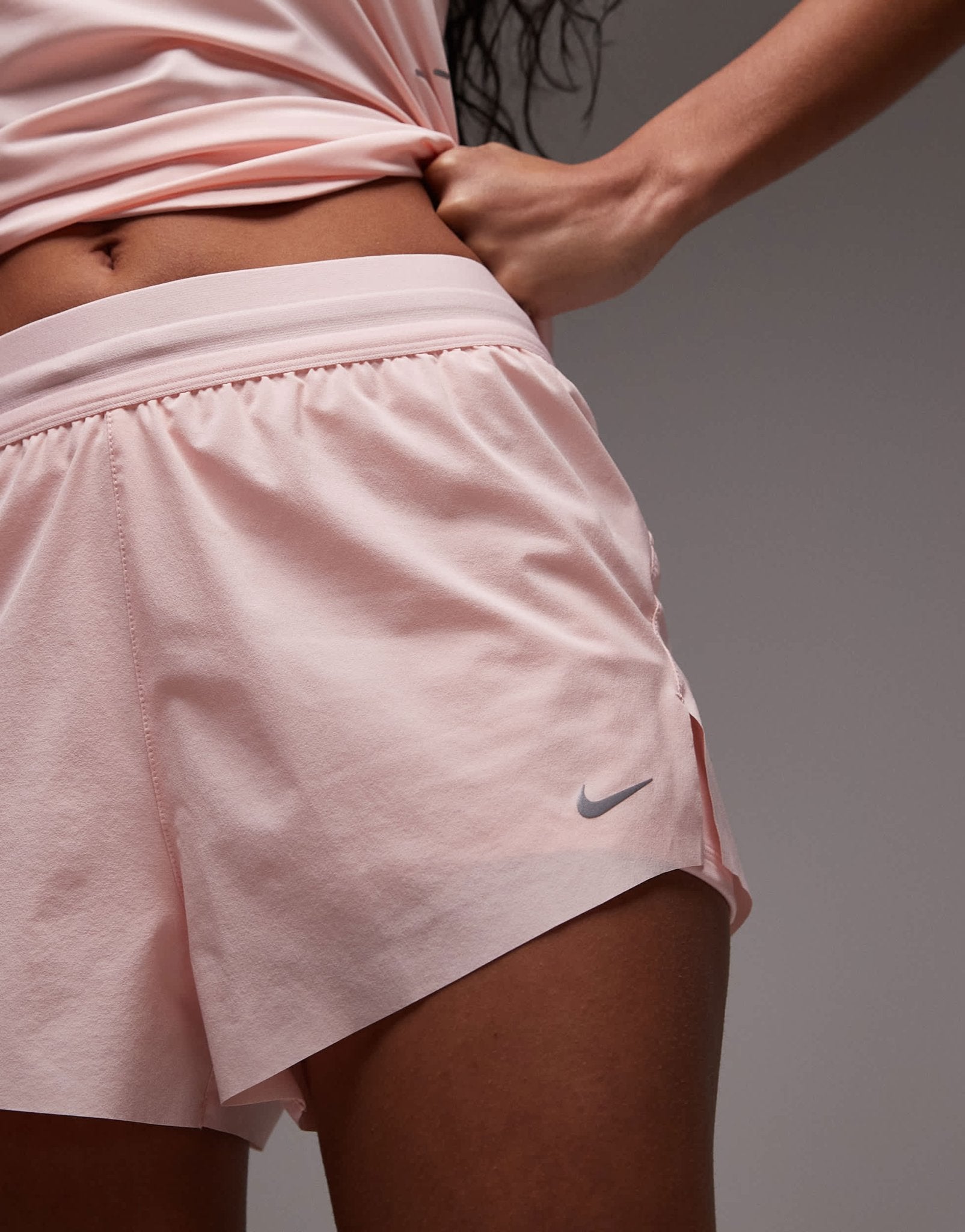 Nike Running Swift Dri-FIT mid rise 3 inch 2 in 1 shorts in pink - ASOS Sample Sale