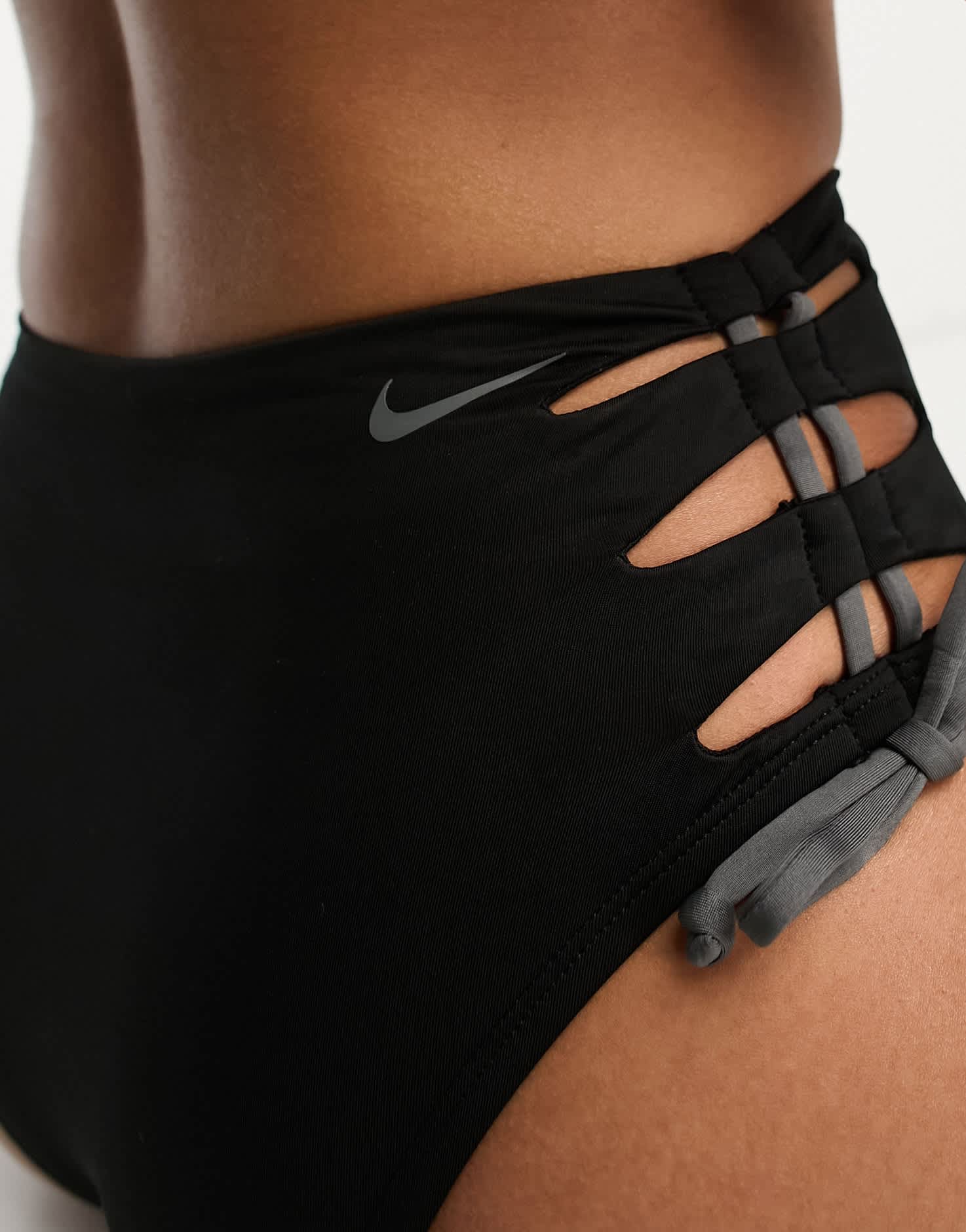 Nike solid lace - up high waist cheeky bikini bottom in black - ASOS Sample Sale