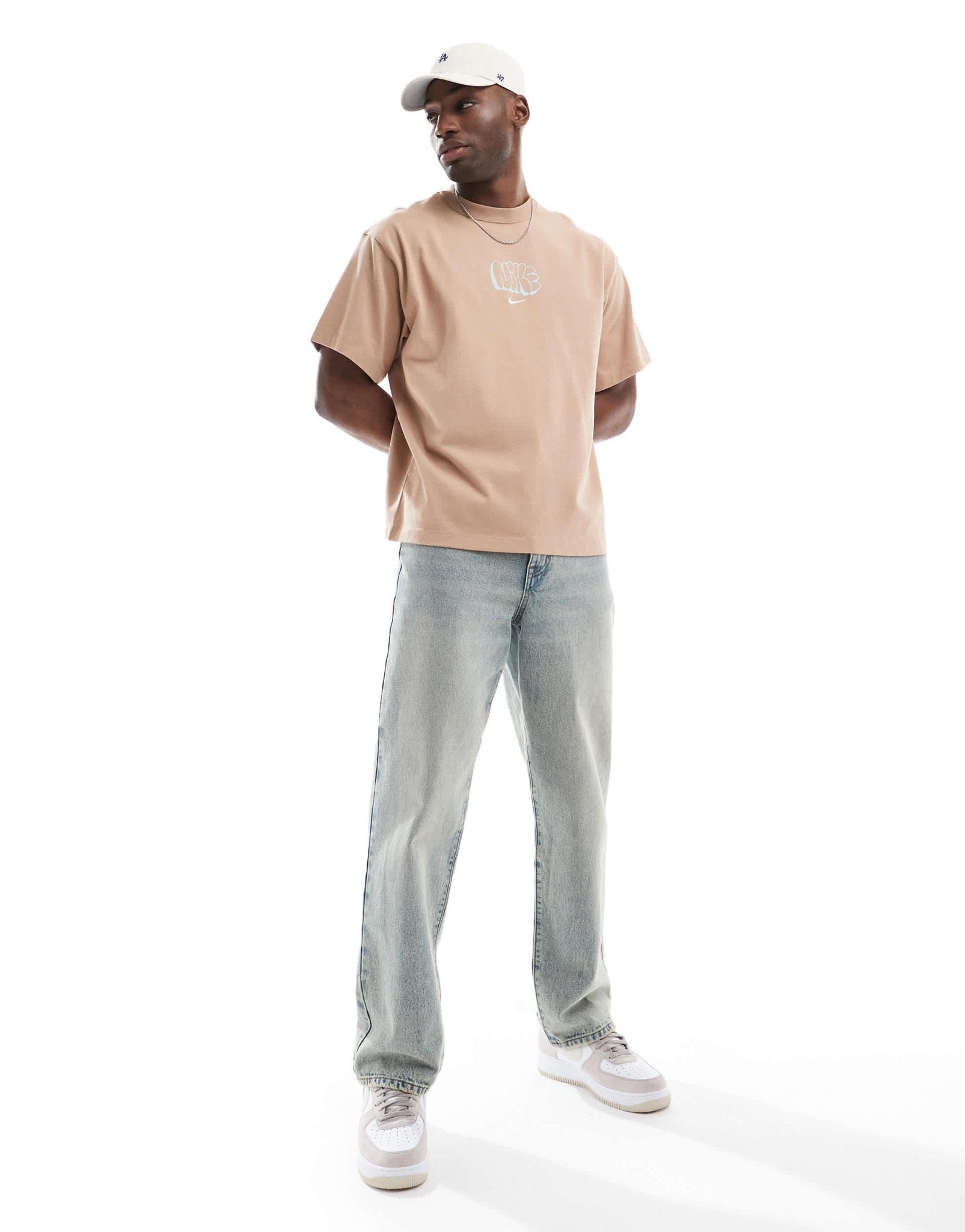 Nike Solo Swoosh graphic t-shirt in brown - ASOS Sample Sale
