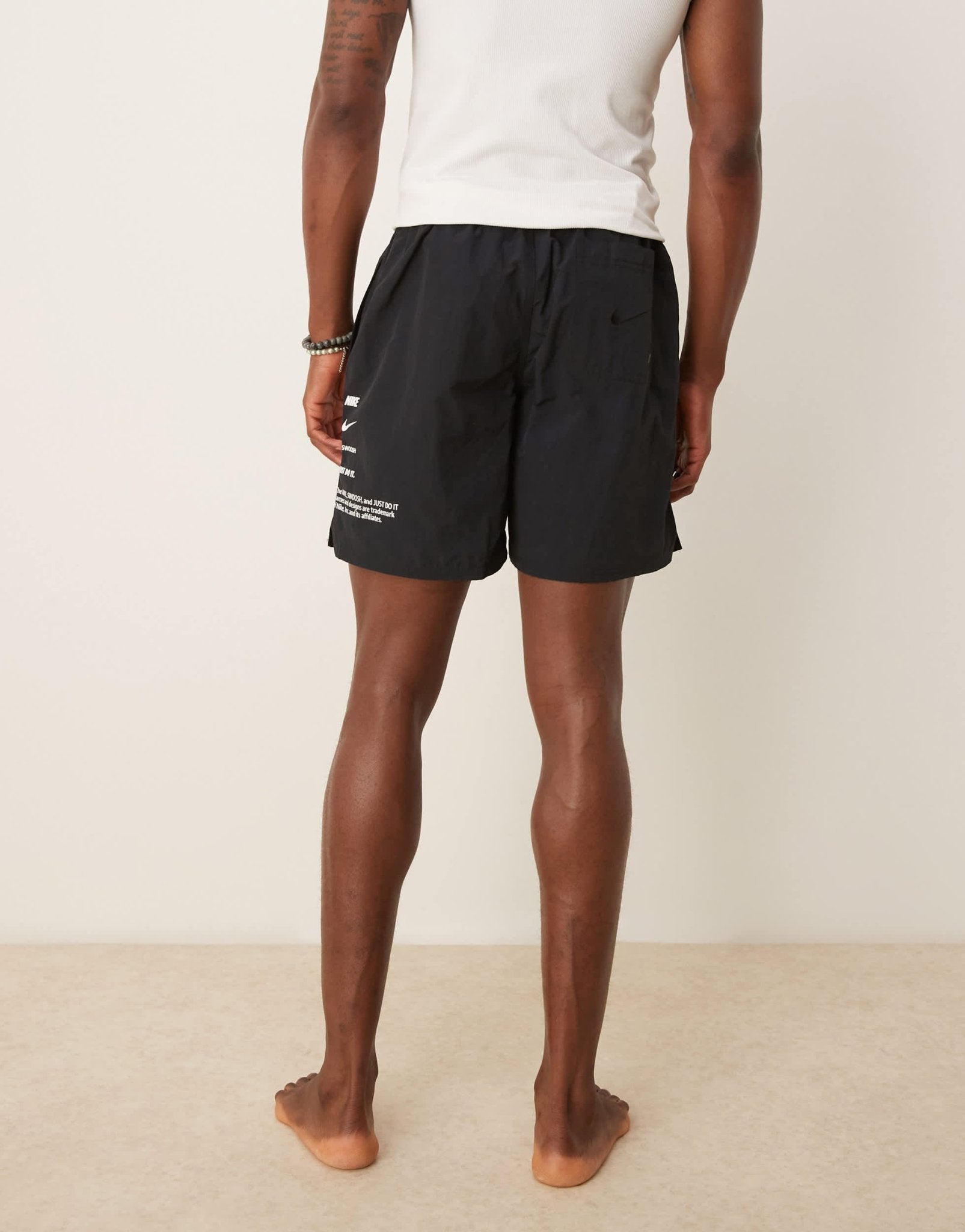 Nike Specs 7 inch Volley swim shorts in black - ASOS Sample Sale