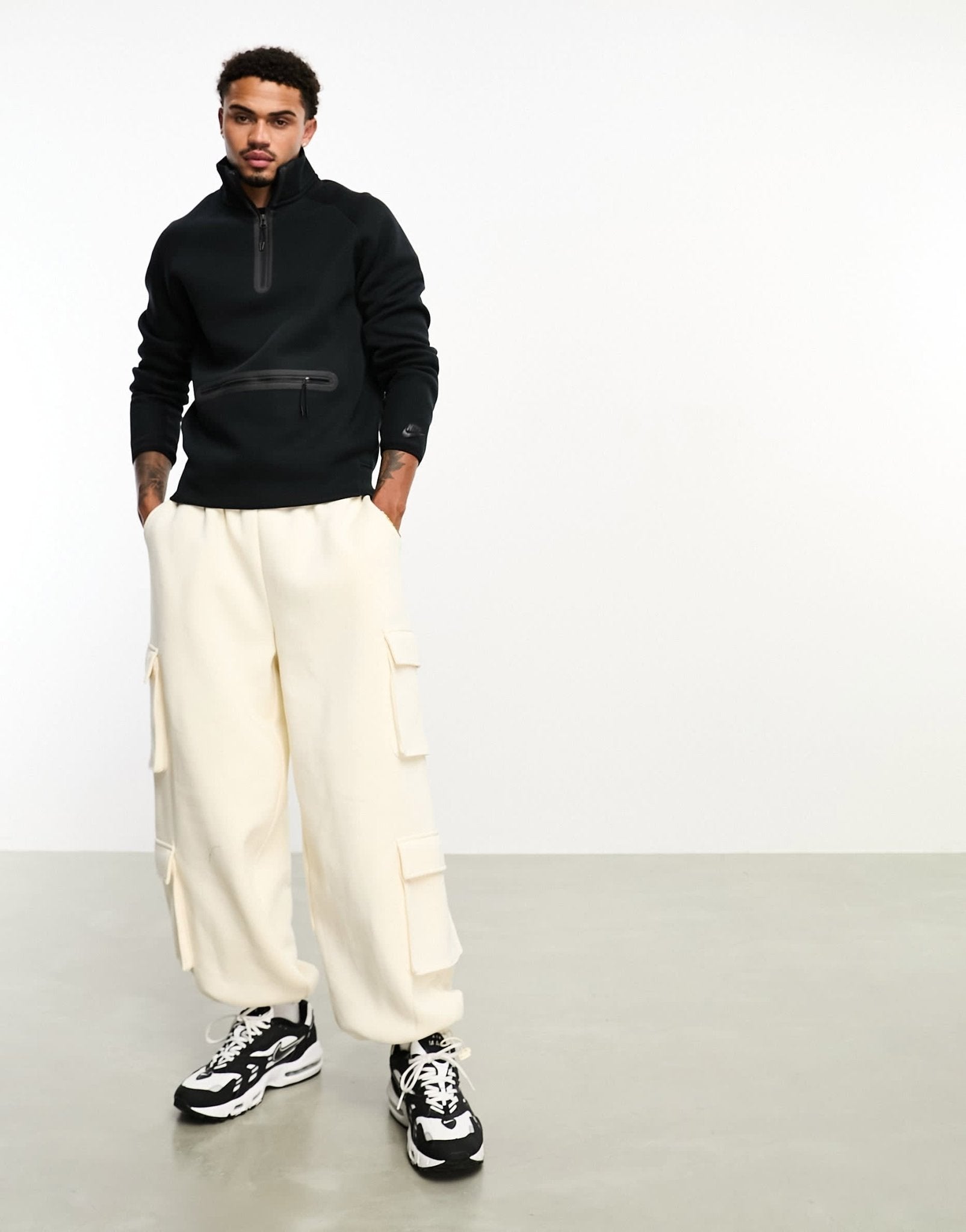 Nike Tech Fleece half zip sweatshirt in black - ASOS Sample Sale