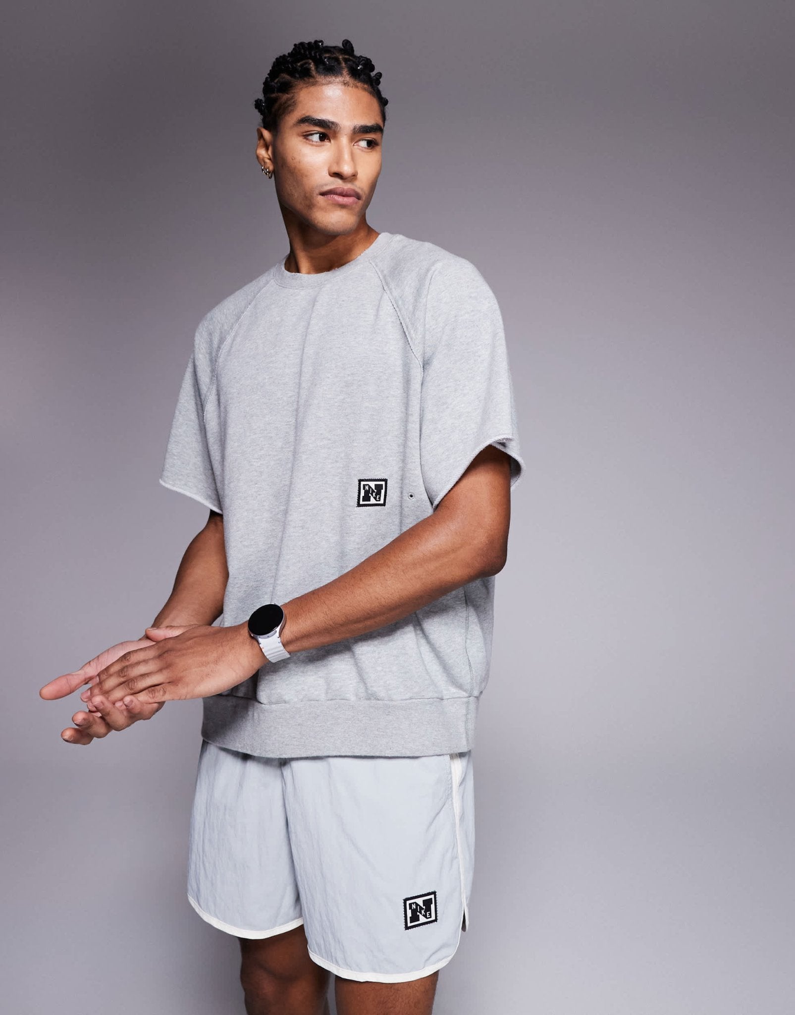 Nike Training Heritage Dri-FIT fleece short sleeve top in grey - ASOS Sample Sale