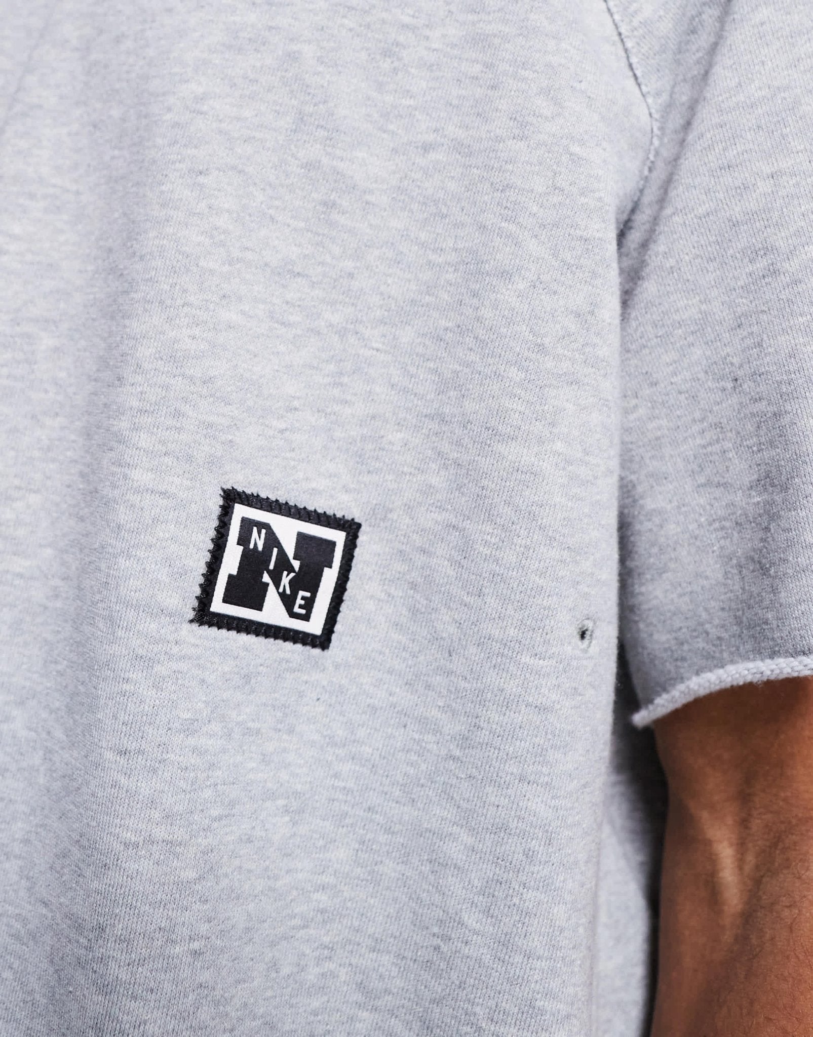 Nike Training Heritage Dri-FIT fleece short sleeve top in grey - ASOS Sample Sale
