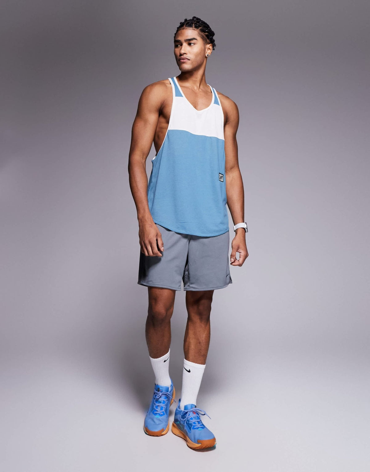 Nike Training Heritage Dri-FIT vest in blue and white - ASOS Sample Sale