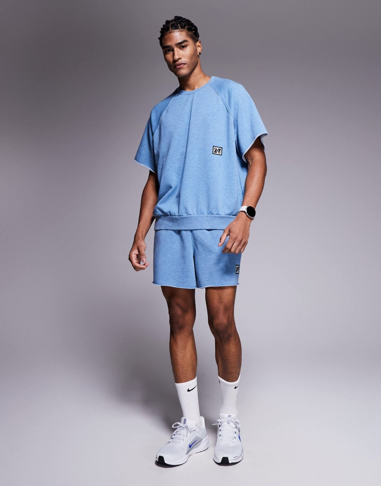 Nike Training Heritage fleece short sleeve top in blue - ASOS Sample Sale