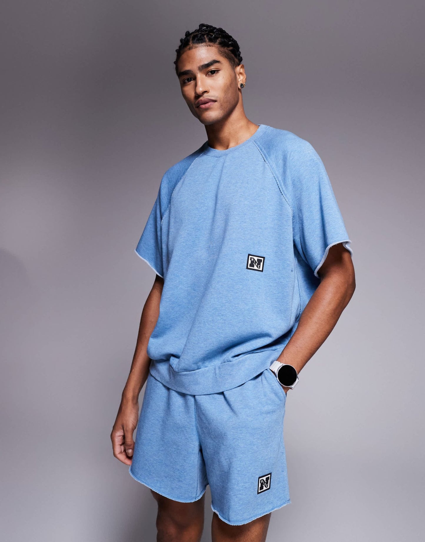 Nike Training Heritage fleece short sleeve top in blue - ASOS Sample Sale