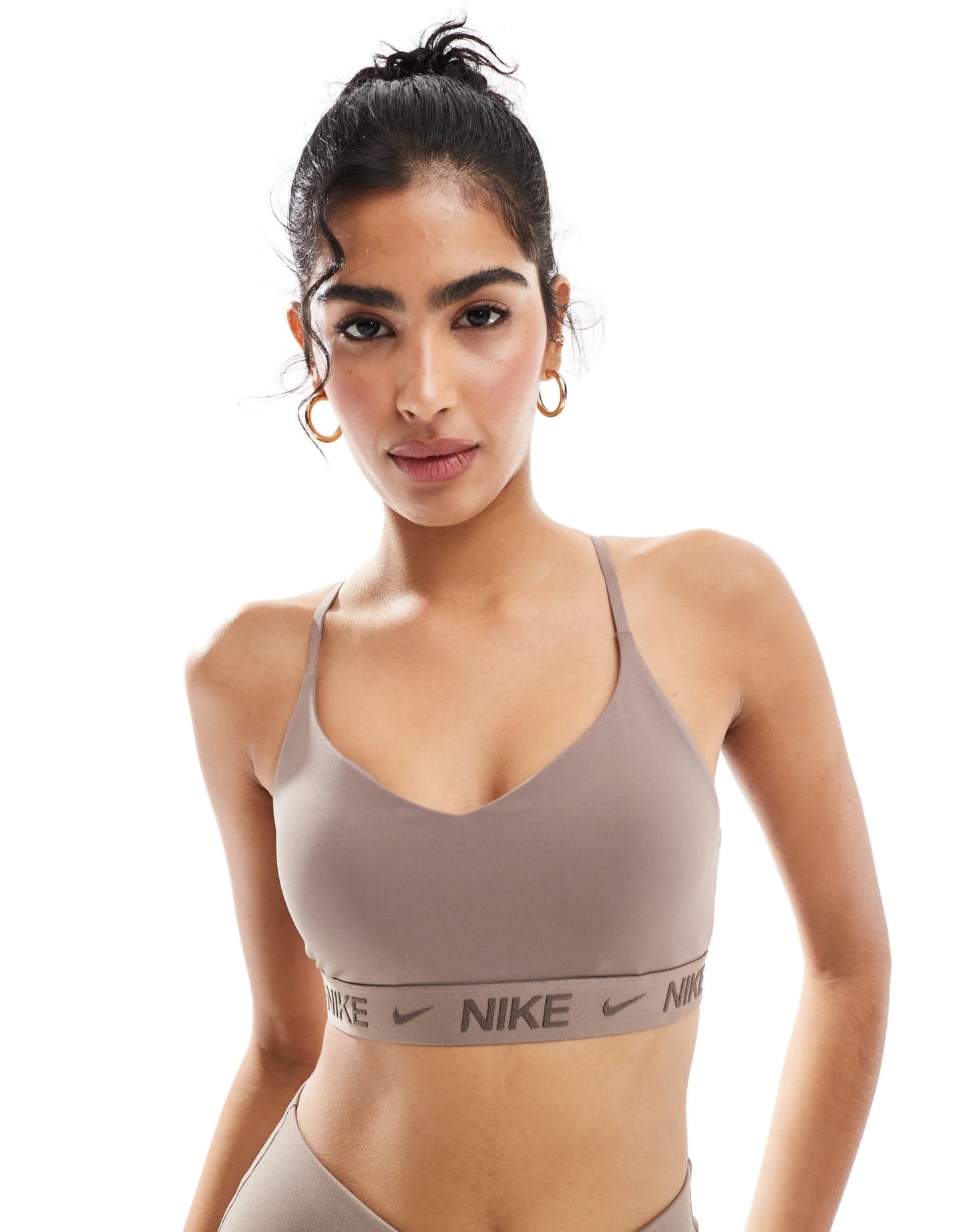 Nike Training Indy Dri - FIT light support sports bra in brown - ASOS Sample Sale
