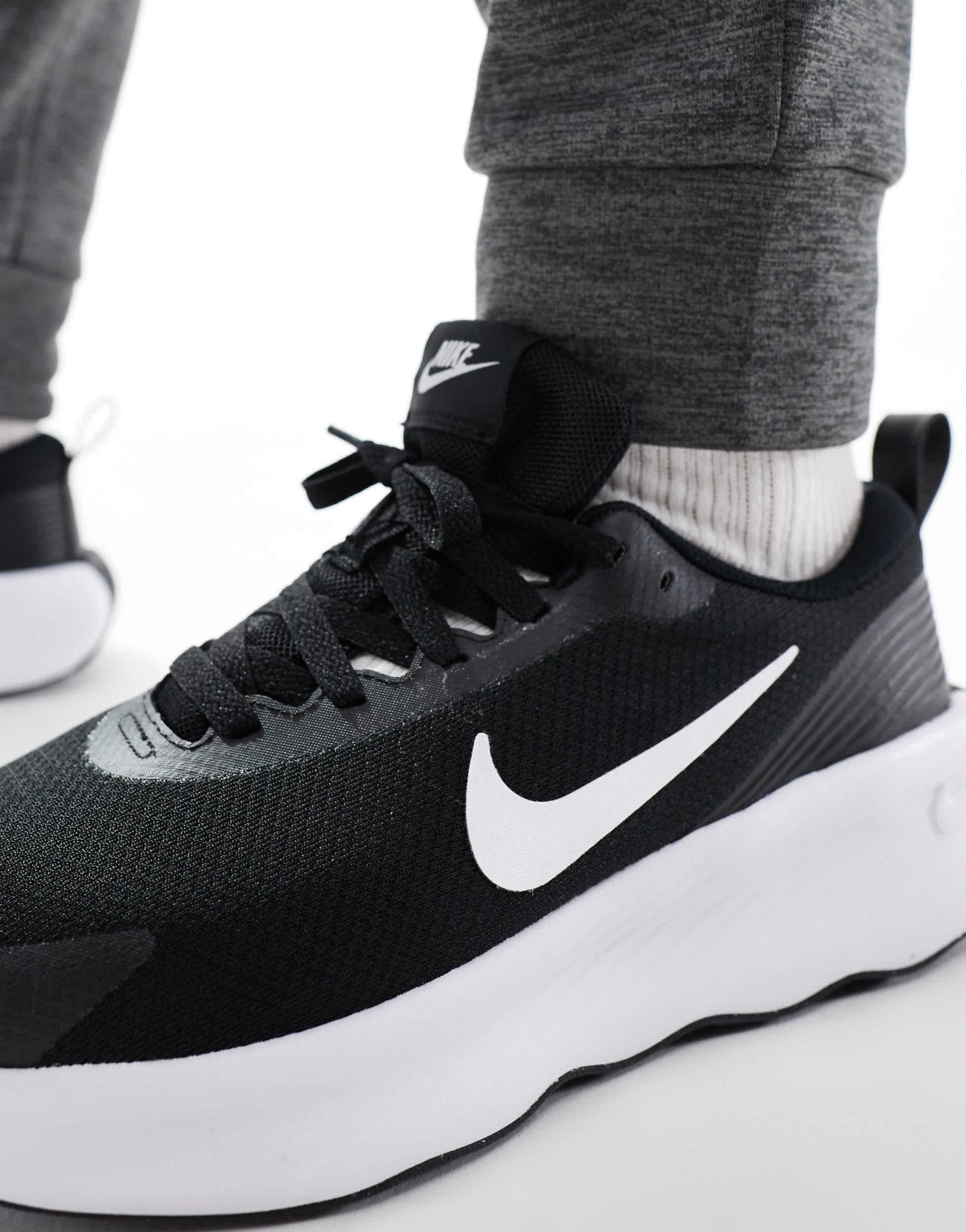 Nike Training Legend Essential 4 trainers in black and white - ASOS Sample Sale