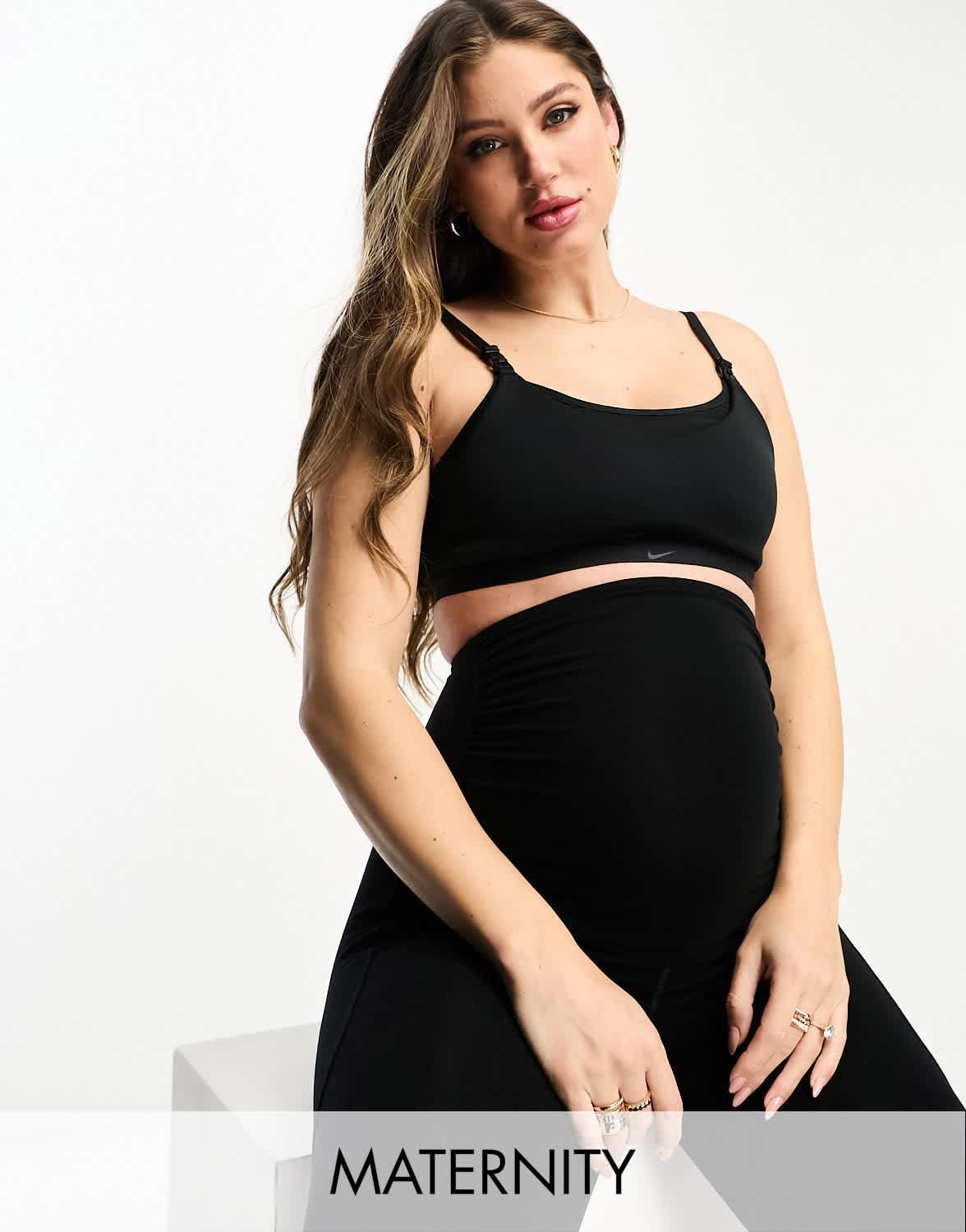 Nike Training Maternity Alate Dri - Fit light support sports bra in black - ASOS Sample Sale