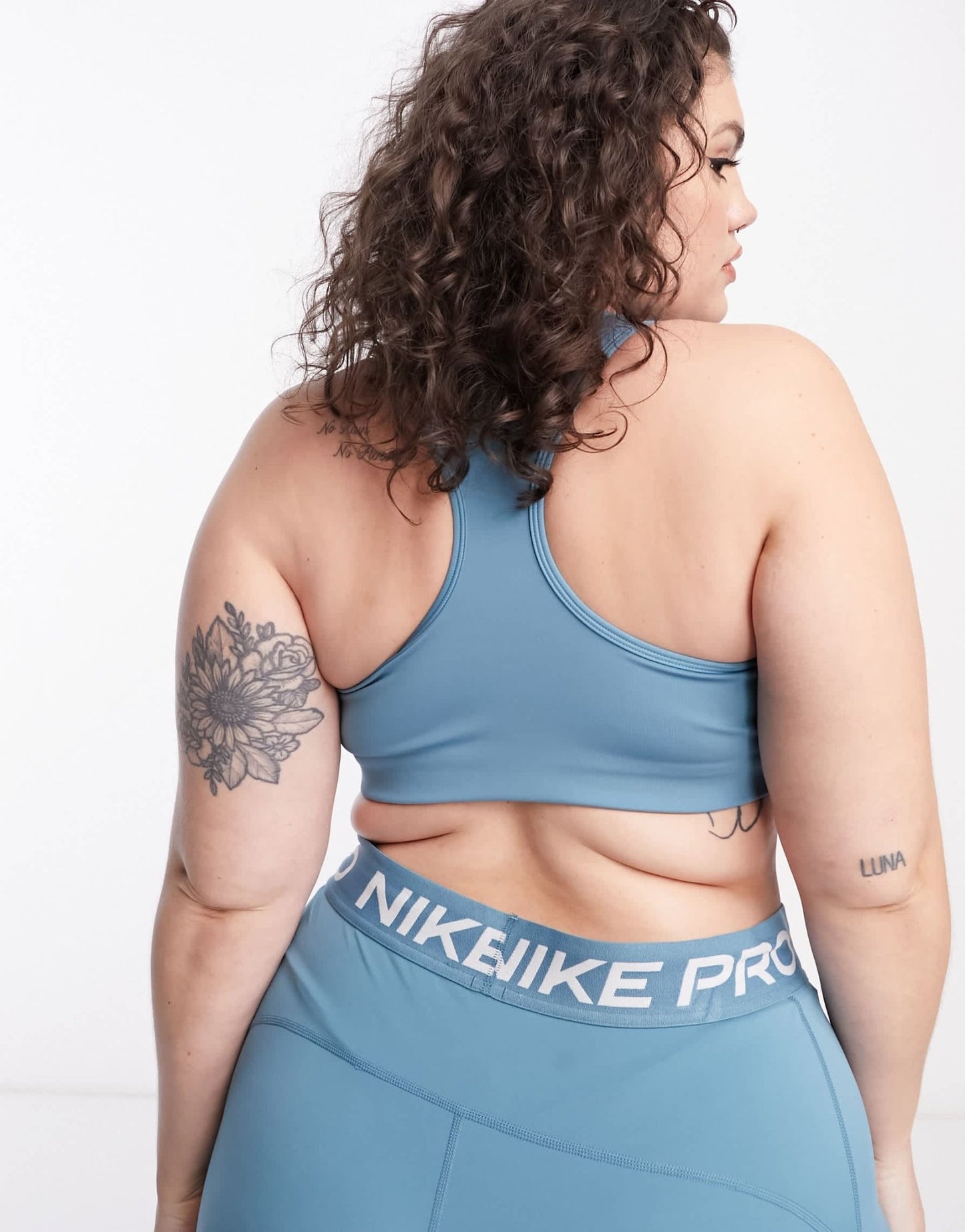 Nike Training Swoosh Plus Dri - FIT padded medium support sports bra in aqua blue - ASOS Sample Sale