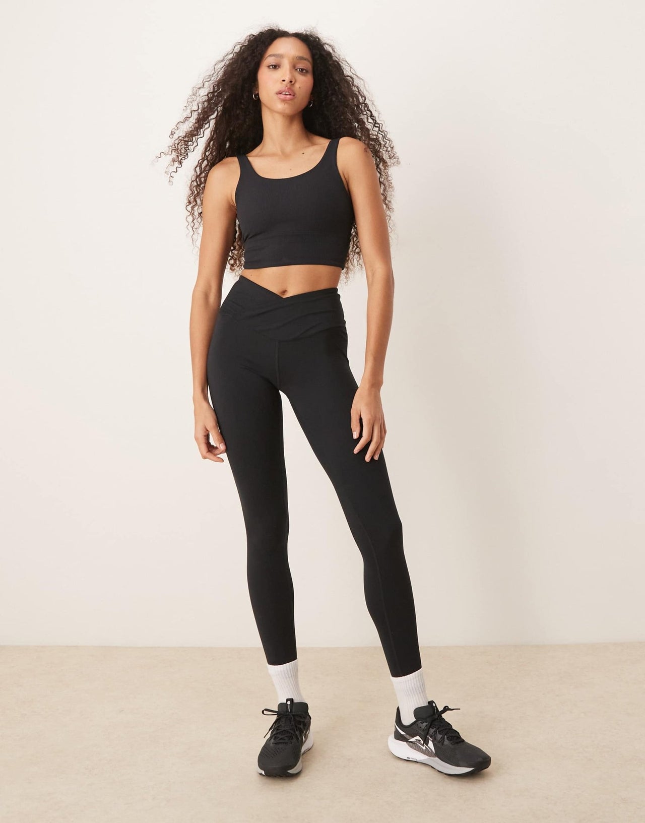 Nike Training Zenvy Dri-FIT ribbed light support sports bra in black - ASOS Sample Sale