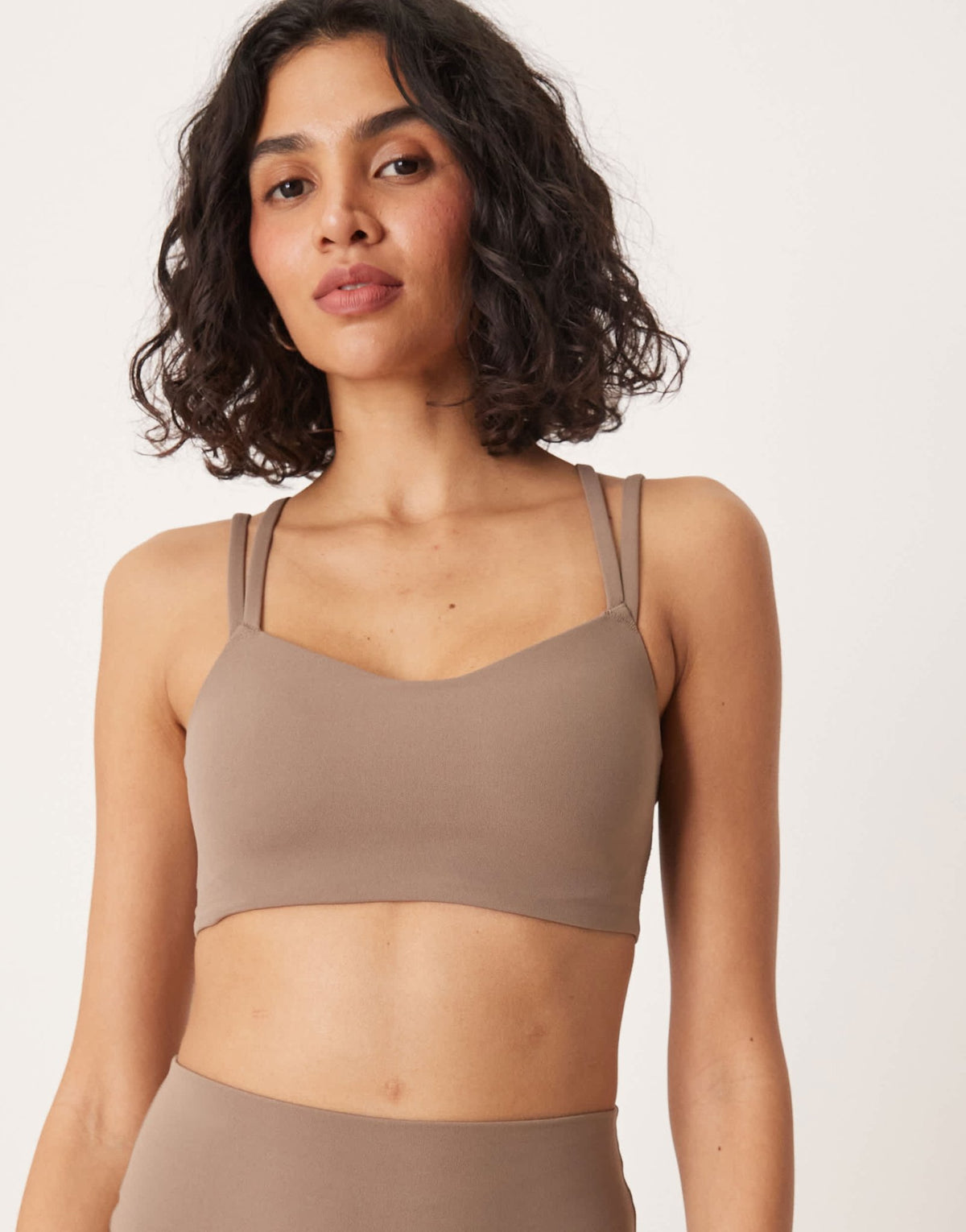 Nike Training Zenvy Dri-FIT soft touch Alate light support sports bra in brown - ASOS Sample Sale
