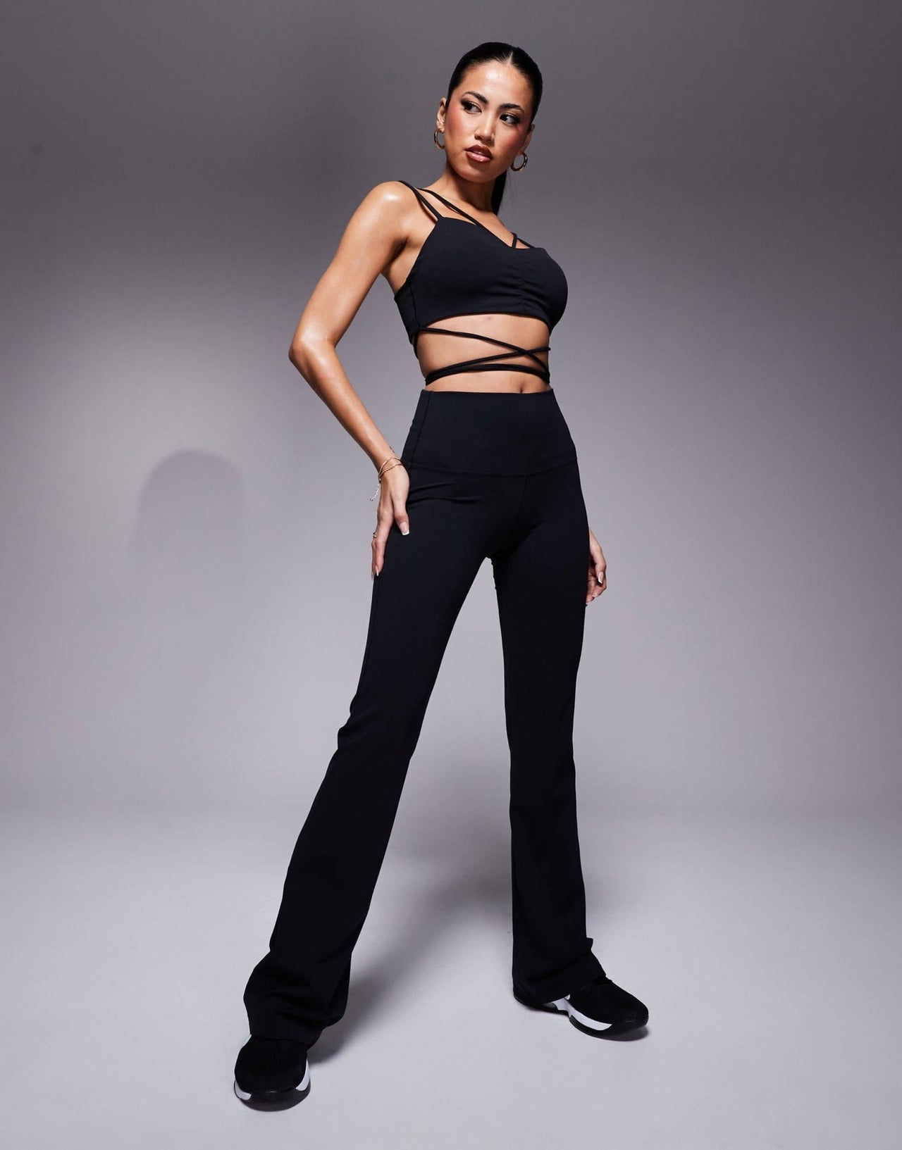 Nike Zenvy Training strappy light support sports bra in black - ASOS Sample Sale