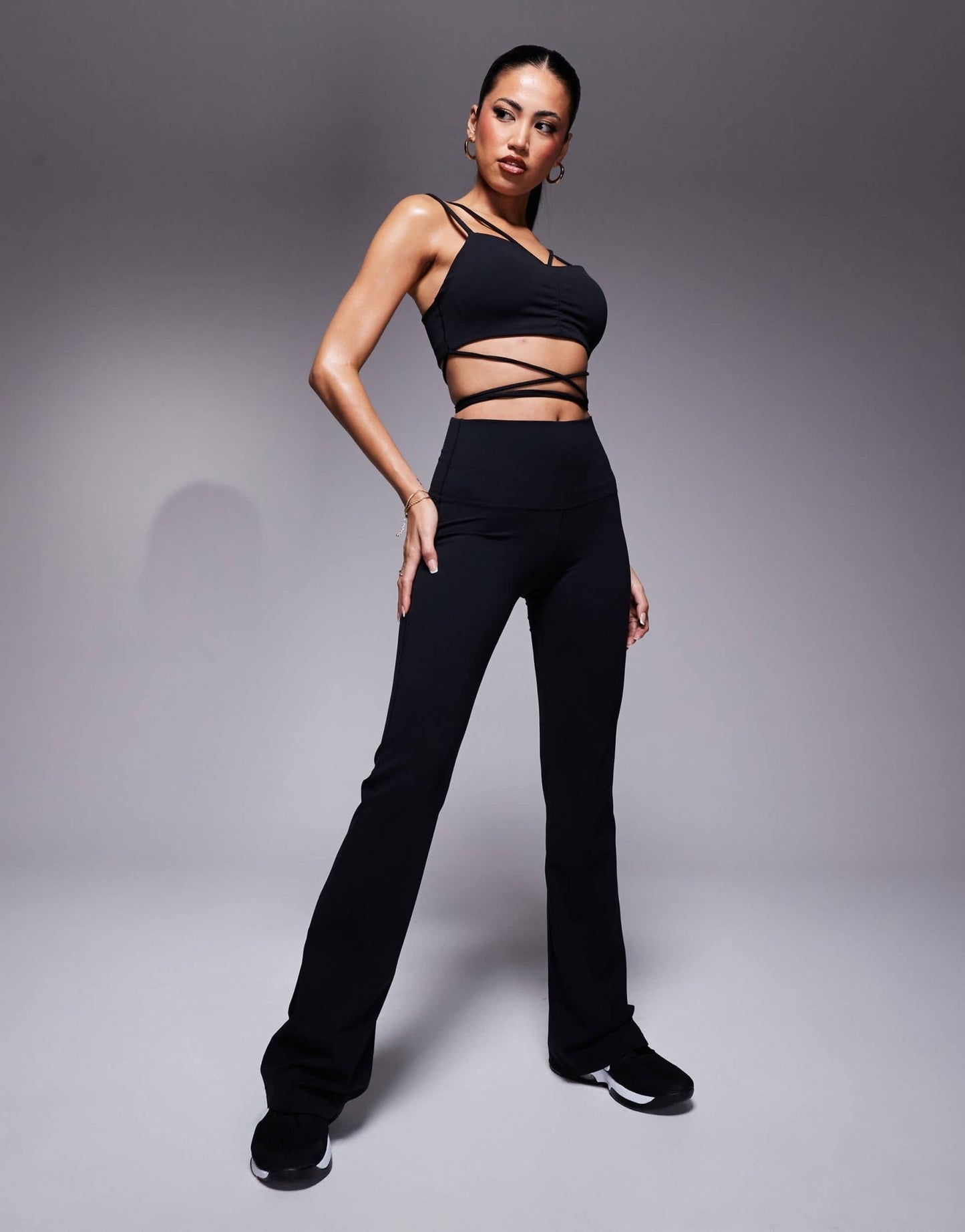 Nike Zenvy Training strappy light support sports bra in black - ASOS Sample Sale