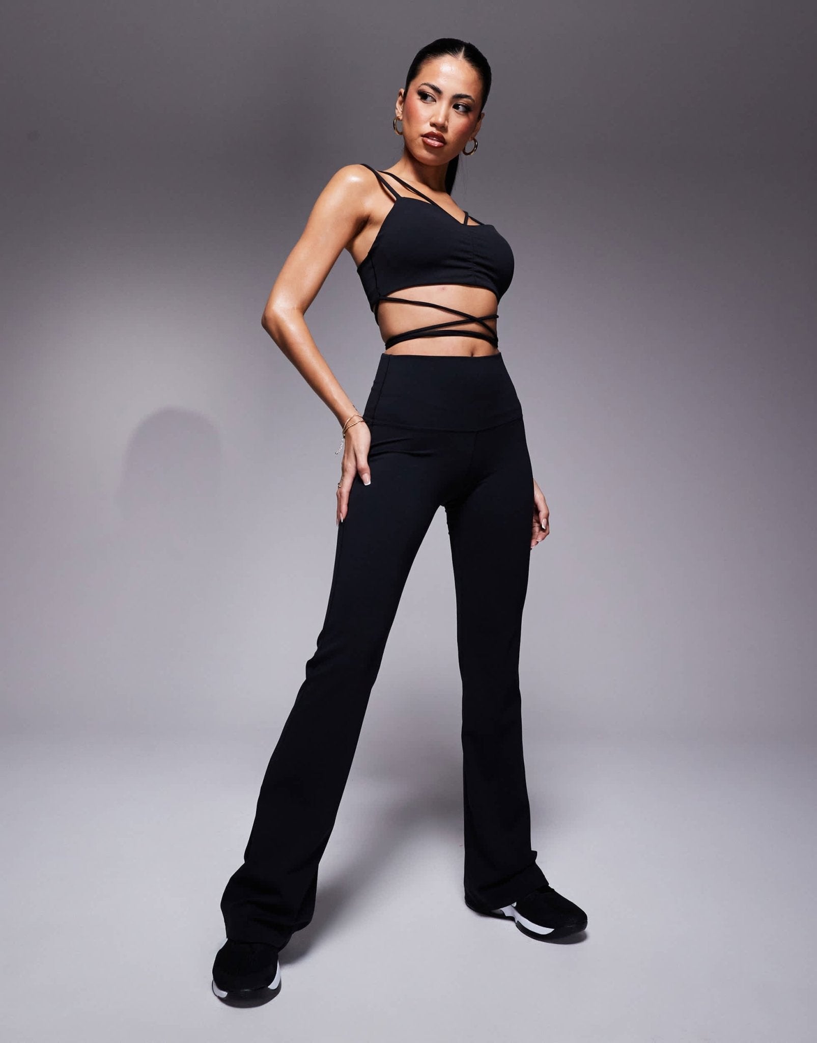 Nike Zenvy Training strappy light support sports bra in black - ASOS Sample Sale