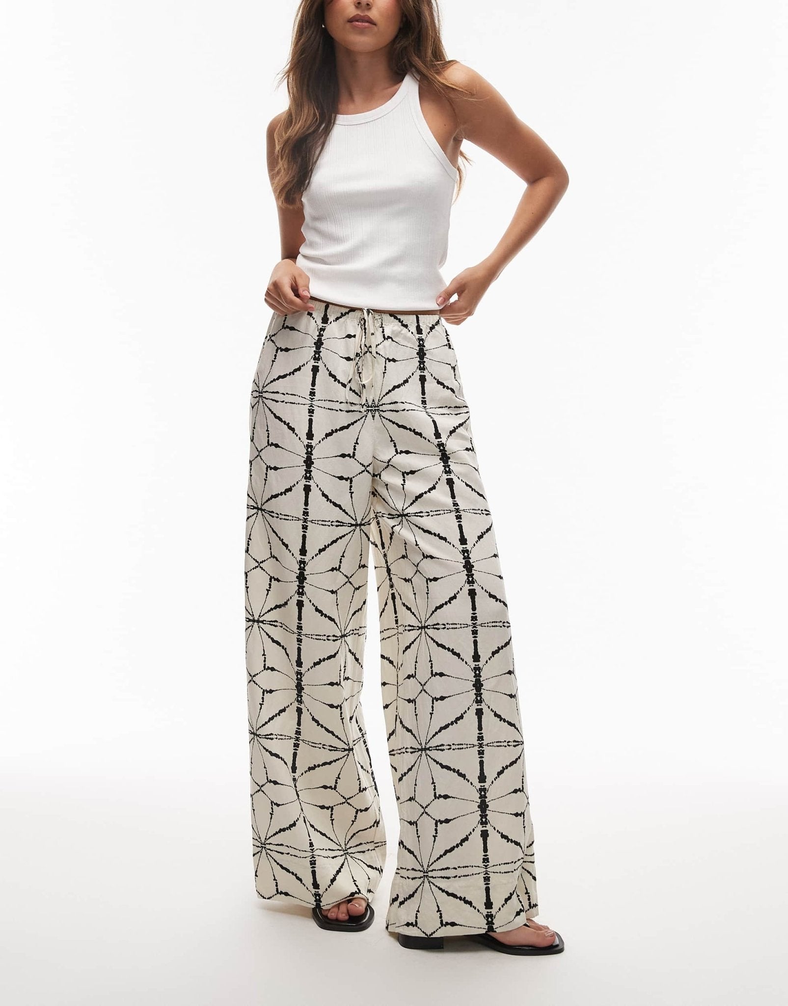 & Other Stories linen wide leg trousers with drawstring waist in off white and black pattern - ASOS Sample Sale