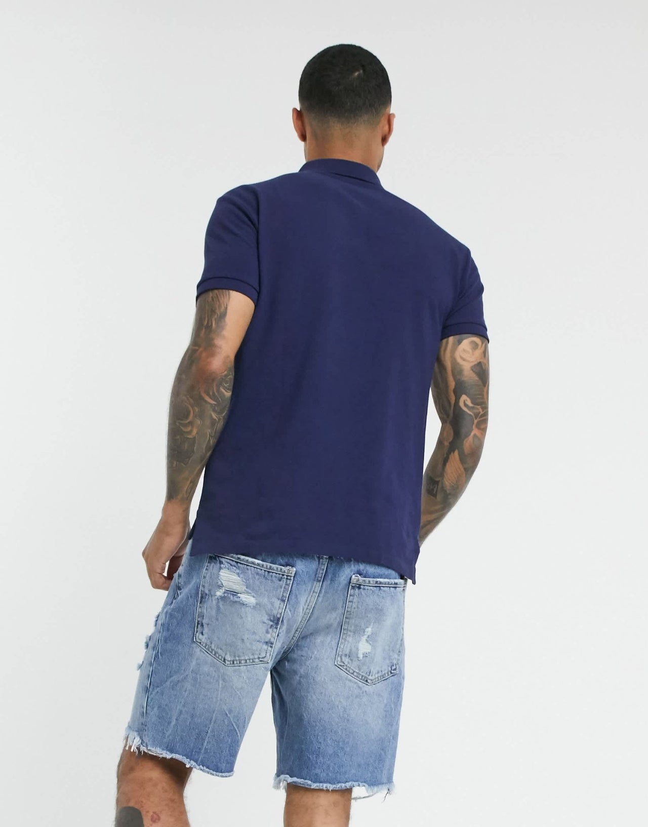 Polo Ralph Lauren slim fit pique polo with red player logo in washed navy - ASOS Sample Sale