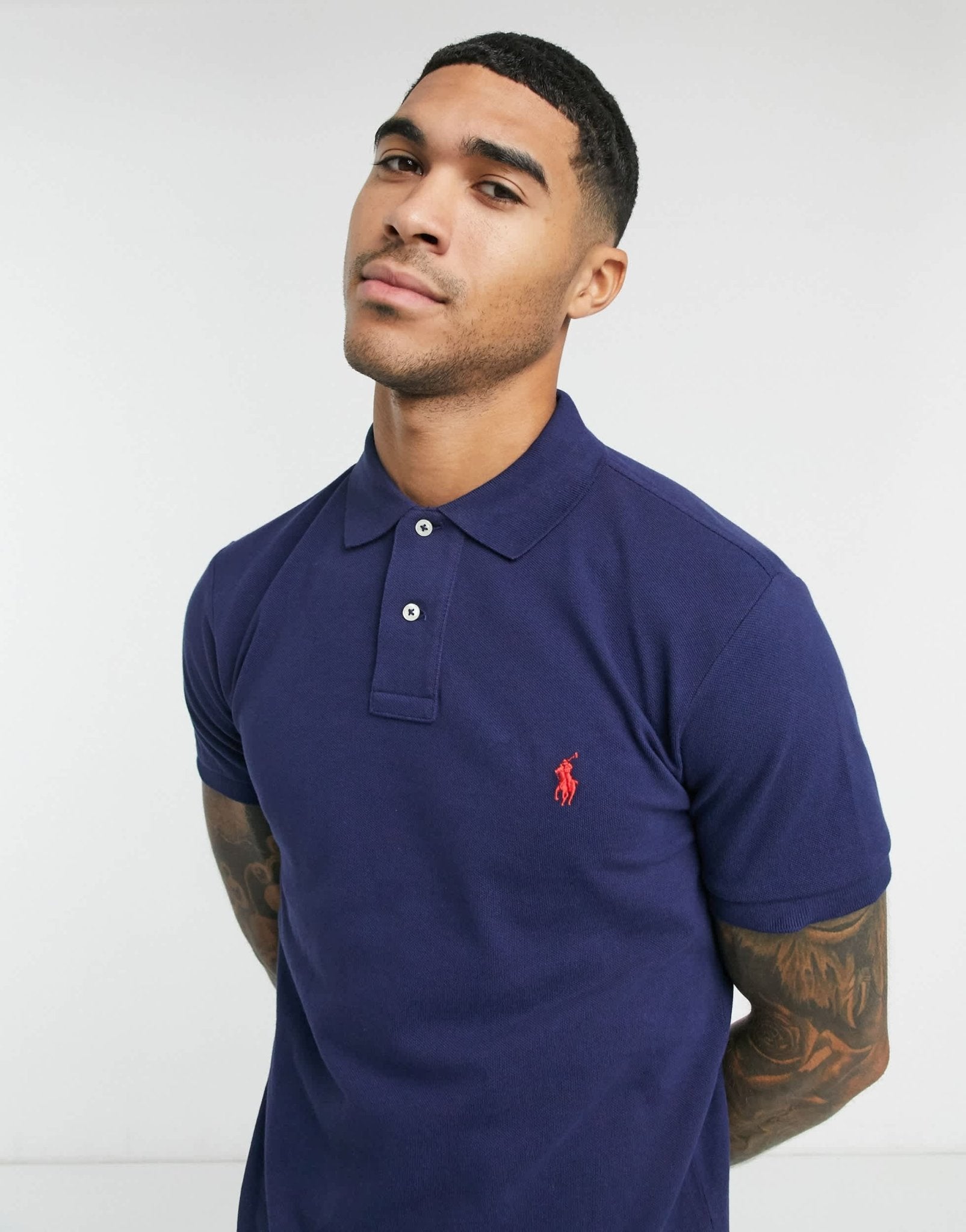 Polo Ralph Lauren slim fit pique polo with red player logo in washed navy - ASOS Sample Sale