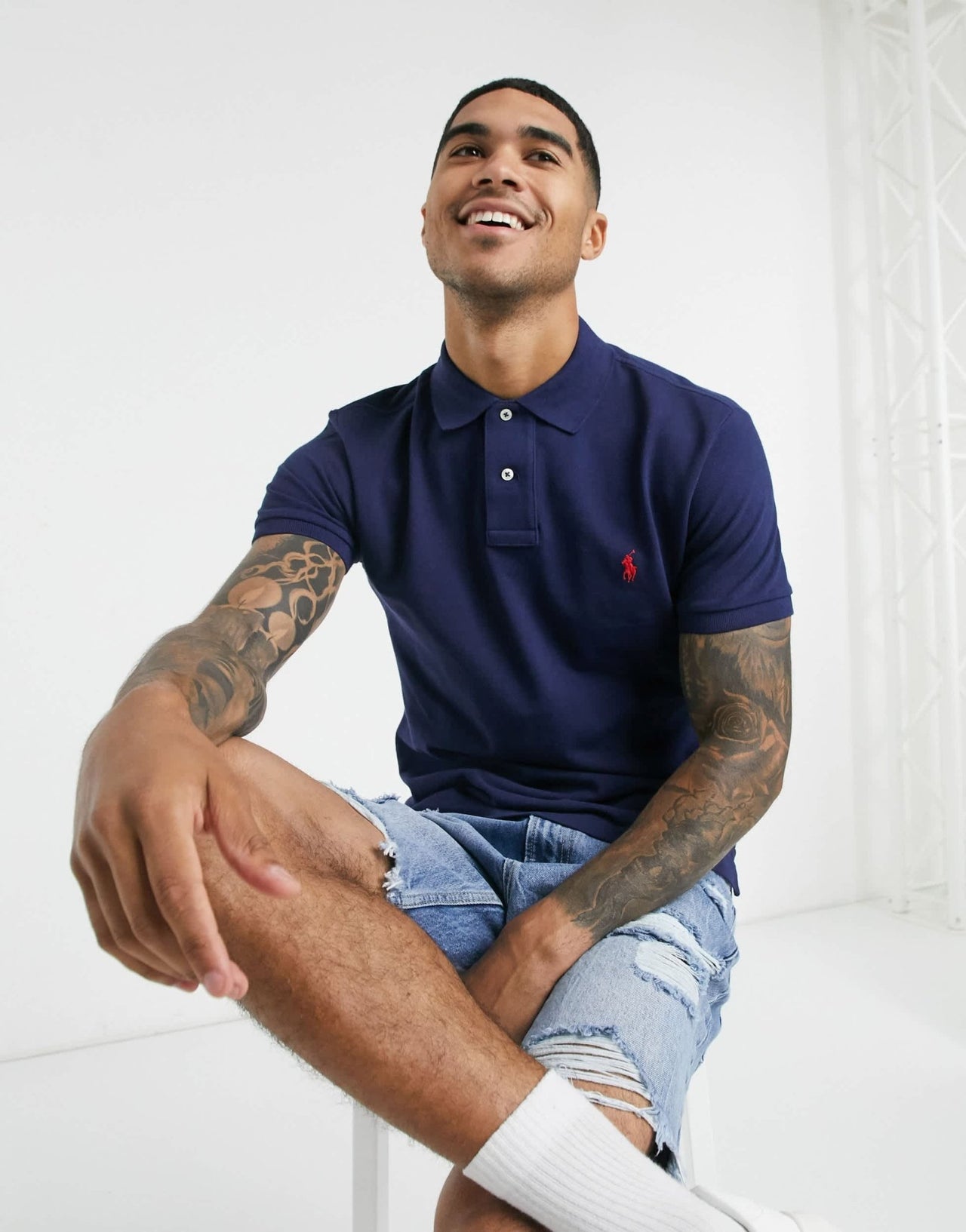 Polo Ralph Lauren slim fit pique polo with red player logo in washed navy - ASOS Sample Sale