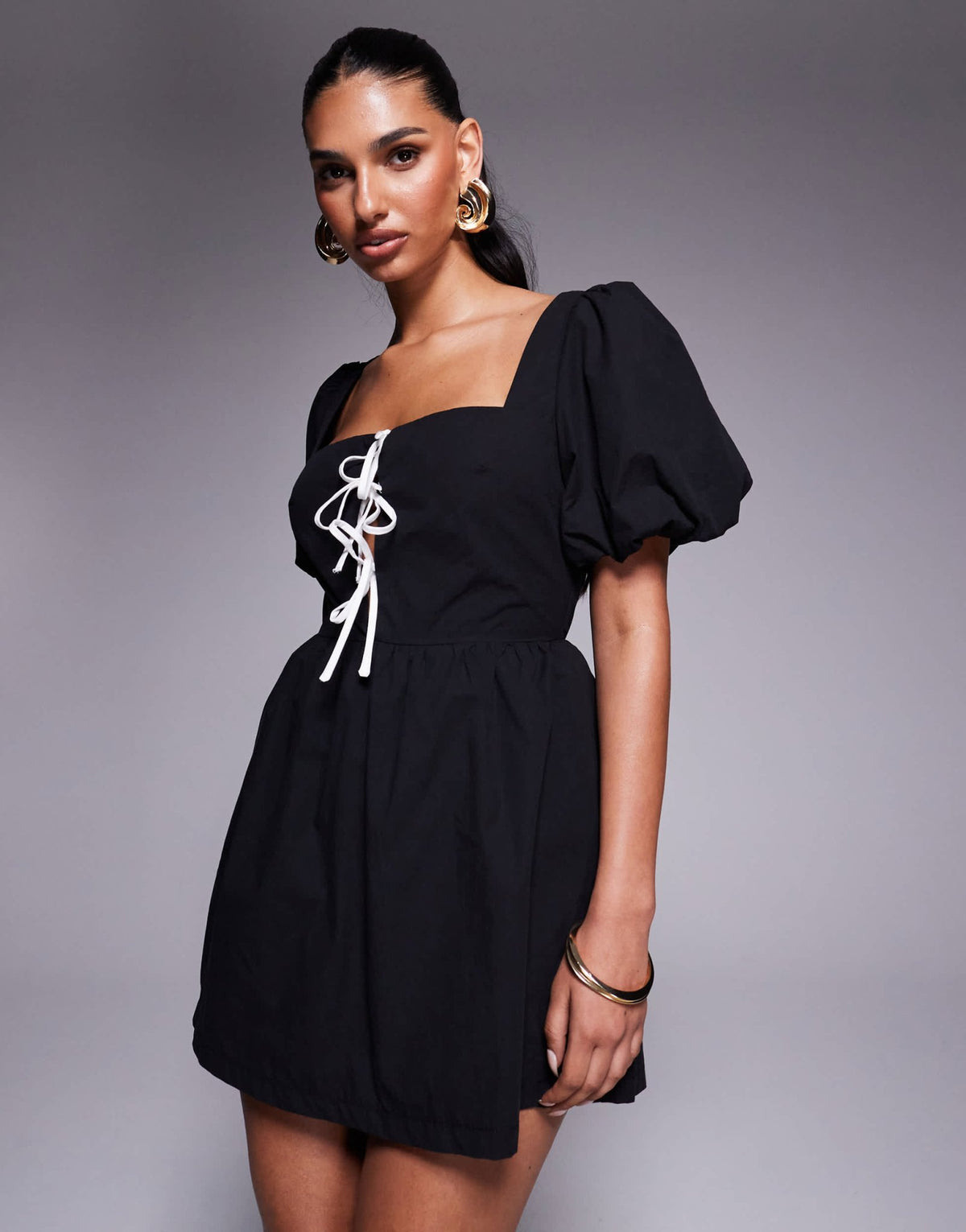 Princess Polly Maelle cotton blend puff sleeve contrast tie front open back playsuit in black and white - ASOS Sample Sale