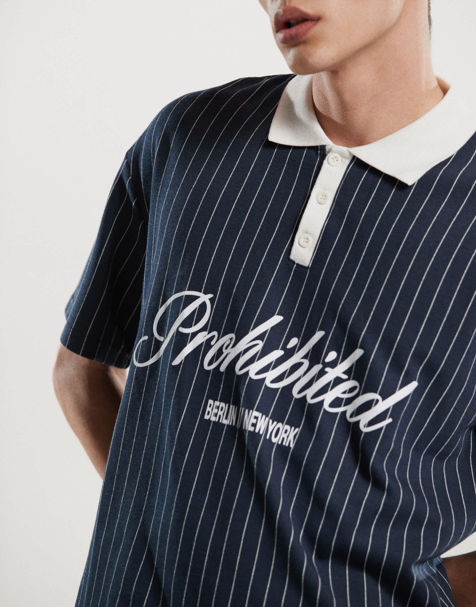 Prohibited collar logo detail football inspired 250gsm shirt in navy stripe - ASOS Sample Sale