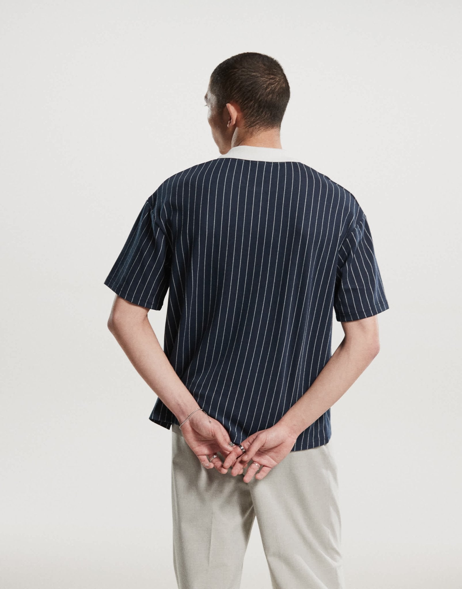 Prohibited collar logo detail football inspired 250gsm shirt in navy stripe - ASOS Sample Sale