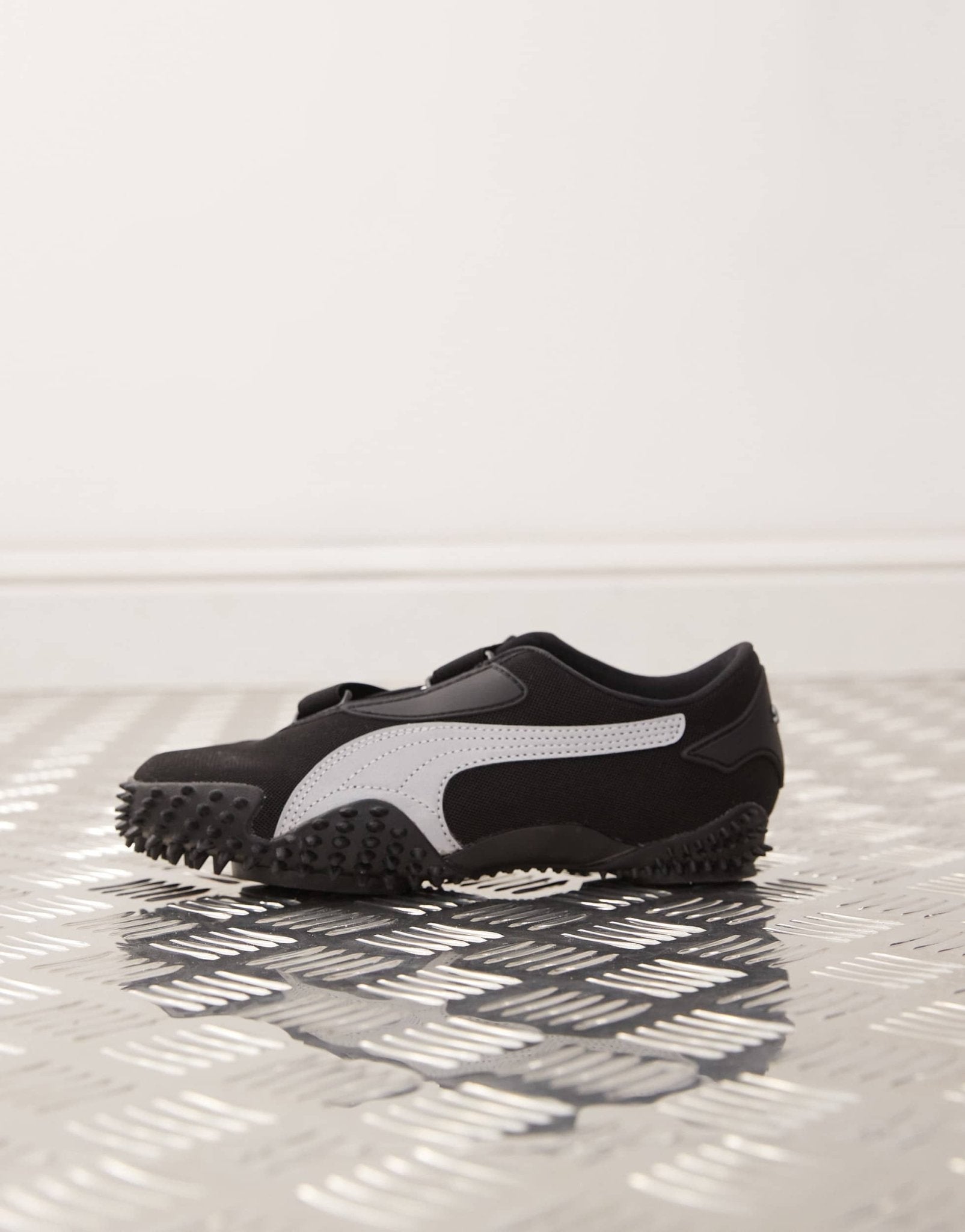 Puma Mostro trainers in black & silver - ASOS Sample Sale
